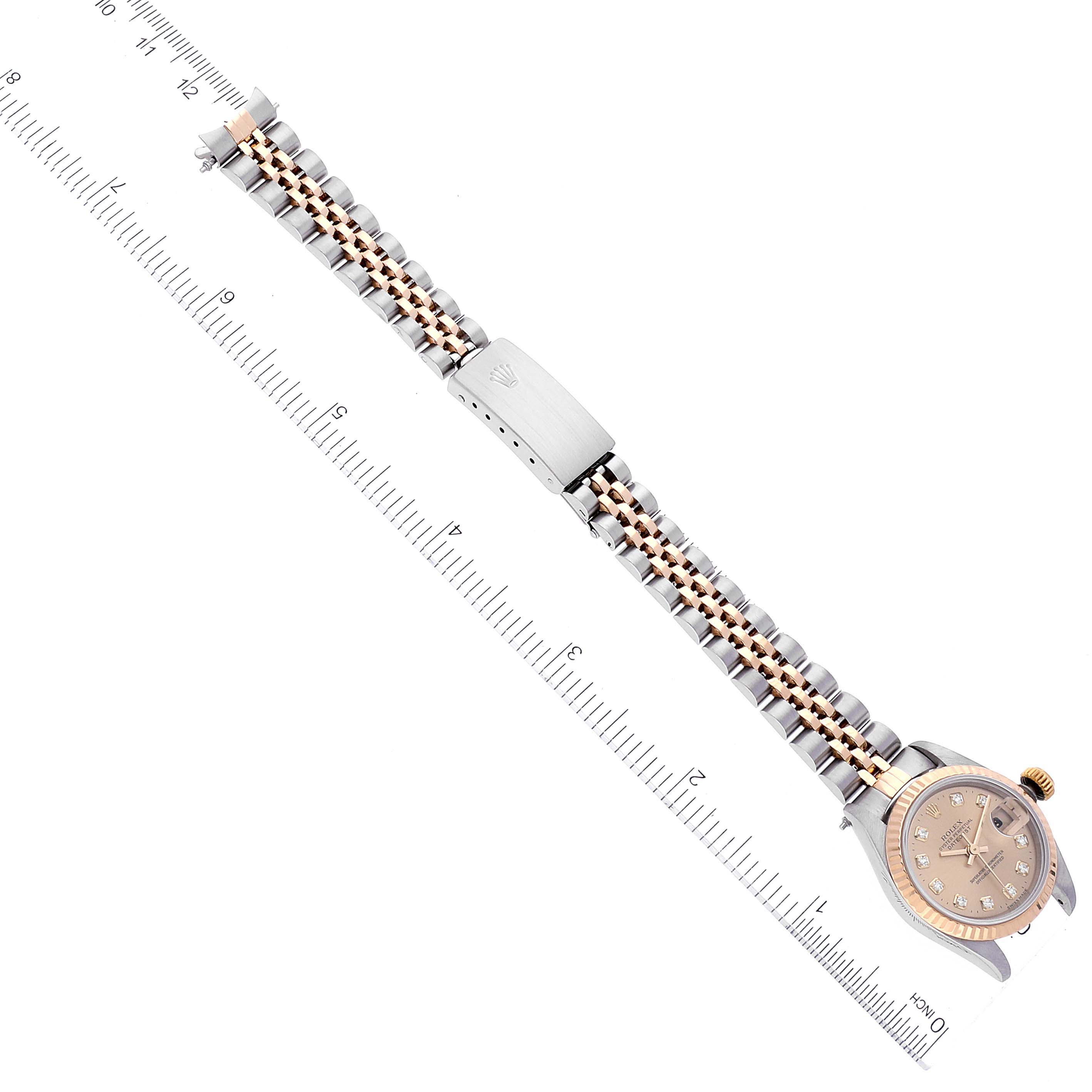 The image shows a Rolex Datejust 69173 Women's Steel and Gold (two tone) Champagne Dial 69173 Women's Steel and Gold (two tone) Champagne Dial watch with its bracelet fully extended, placed alongside a ruler for measurement.