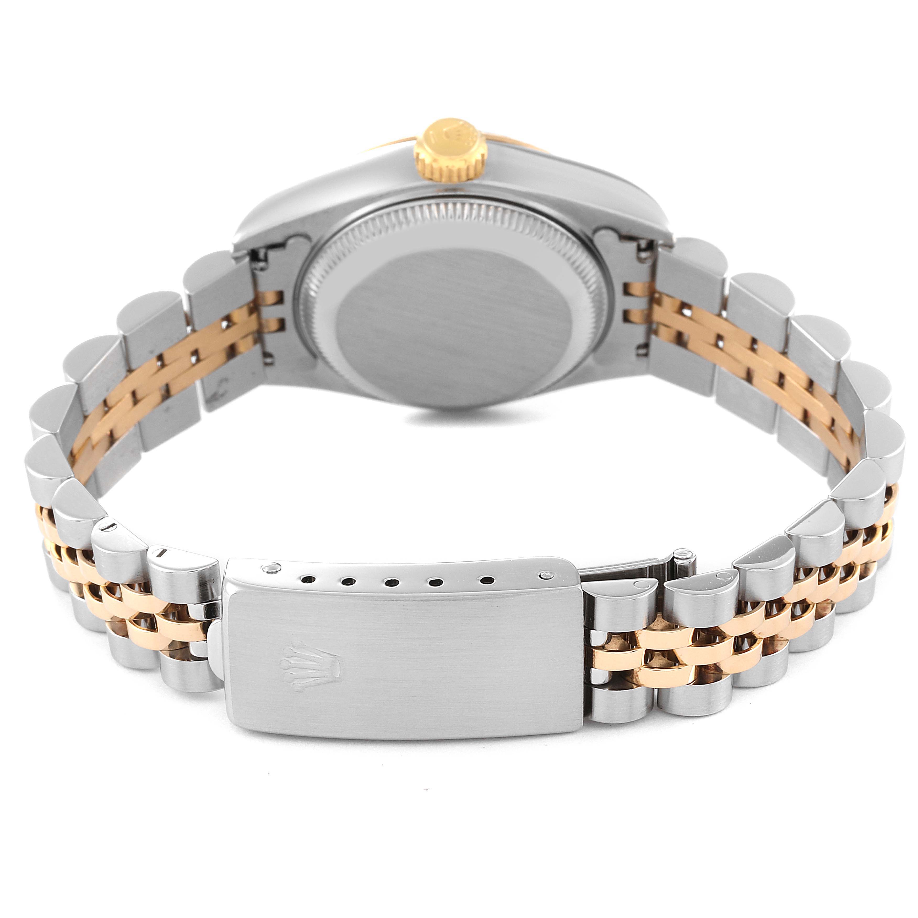 The image shows the back view of a Rolex Datejust 69173 Women's Steel and Gold (two tone) Champagne Dial 69173 Women's Steel and Gold (two tone) Champagne Dial watch highlighting its case, crown, and the Jubilee bracelet.