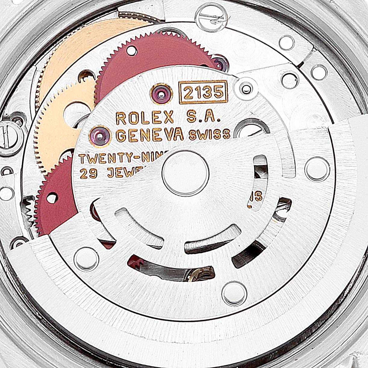 The image shows a close-up view of the inner mechanical movement of a Rolex Datejust 69173 Women's Steel and Gold (two tone) Champagne Dial 69173 Women's Steel and Gold (two tone) Champagne Dial watch, focusing on the gears and the rotor.