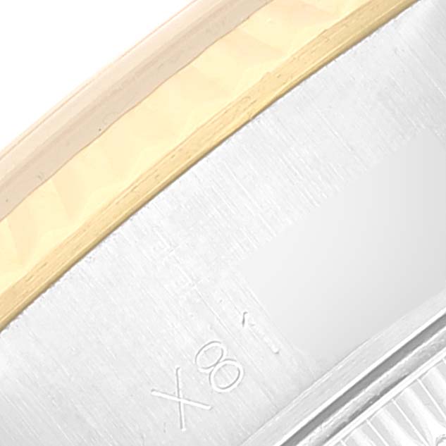 The image shows a close-up angle of the case back edge and part of the bracelet of a Rolex Datejust 69173 Women's Steel and Gold (two tone) Champagne Dial 69173 Women's Steel and Gold (two tone) Champagne Dial watch.