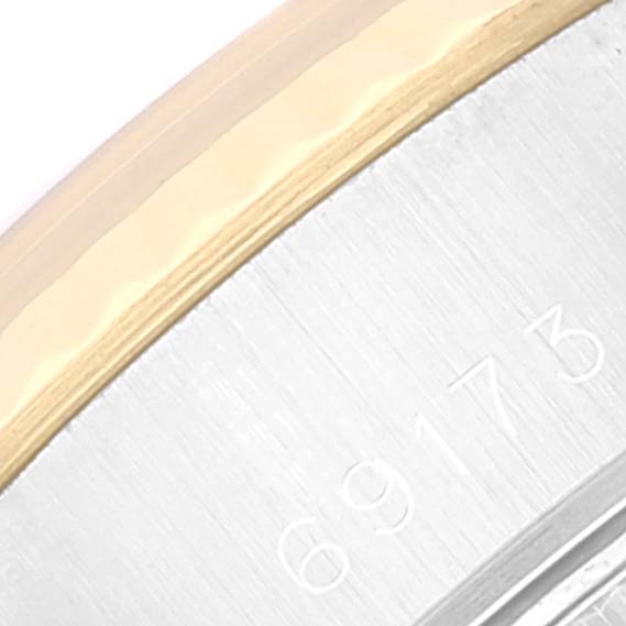 The image shows a close-up of the side of the Rolex Datejust 69173 Women's Steel and Gold (two tone) Champagne Dial 69173 Women's Steel and Gold (two tone) Champagne Dial watch case, revealing its model number 69173.