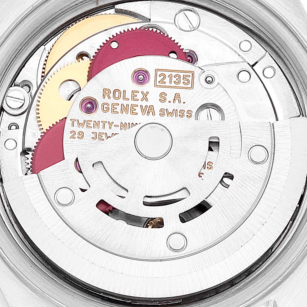 The image shows the movement mechanism of a Rolex Datejust 69173 Women's Steel and Gold (two tone) Beige Dial 69173 Women's Steel and Gold (two tone) Beige Dial watch, specifically the rotor and gears.