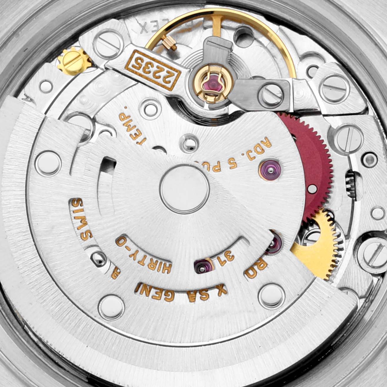 This image shows a close-up view of the movement and inner mechanism of the Rolex Datejust 79173 Women's Steel and Gold (two tone) White Dial 79173 Women's Steel and Gold (two tone) White Dial watch.