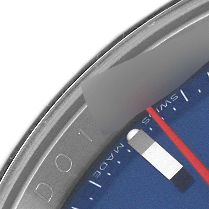 This close-up angle shows a portion of the bezel and dial, including the "Made" from "Made in Switzerland" marking on the Rolex Turn-o-Graph 116264 Men's Stainless Steel Blue Dial 116264 Men's Stainless Steel Blue Dial watch.