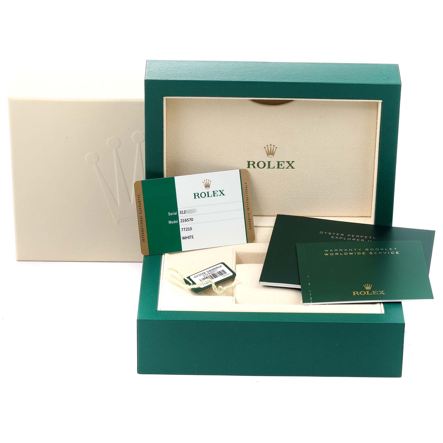 The image shows a Rolex Explorer 216570 Men
s Stainless Steel White Dial 216570 Men
s Stainless Steel White Dial box with warranty cards, tags, and booklets, but no watch visible.
