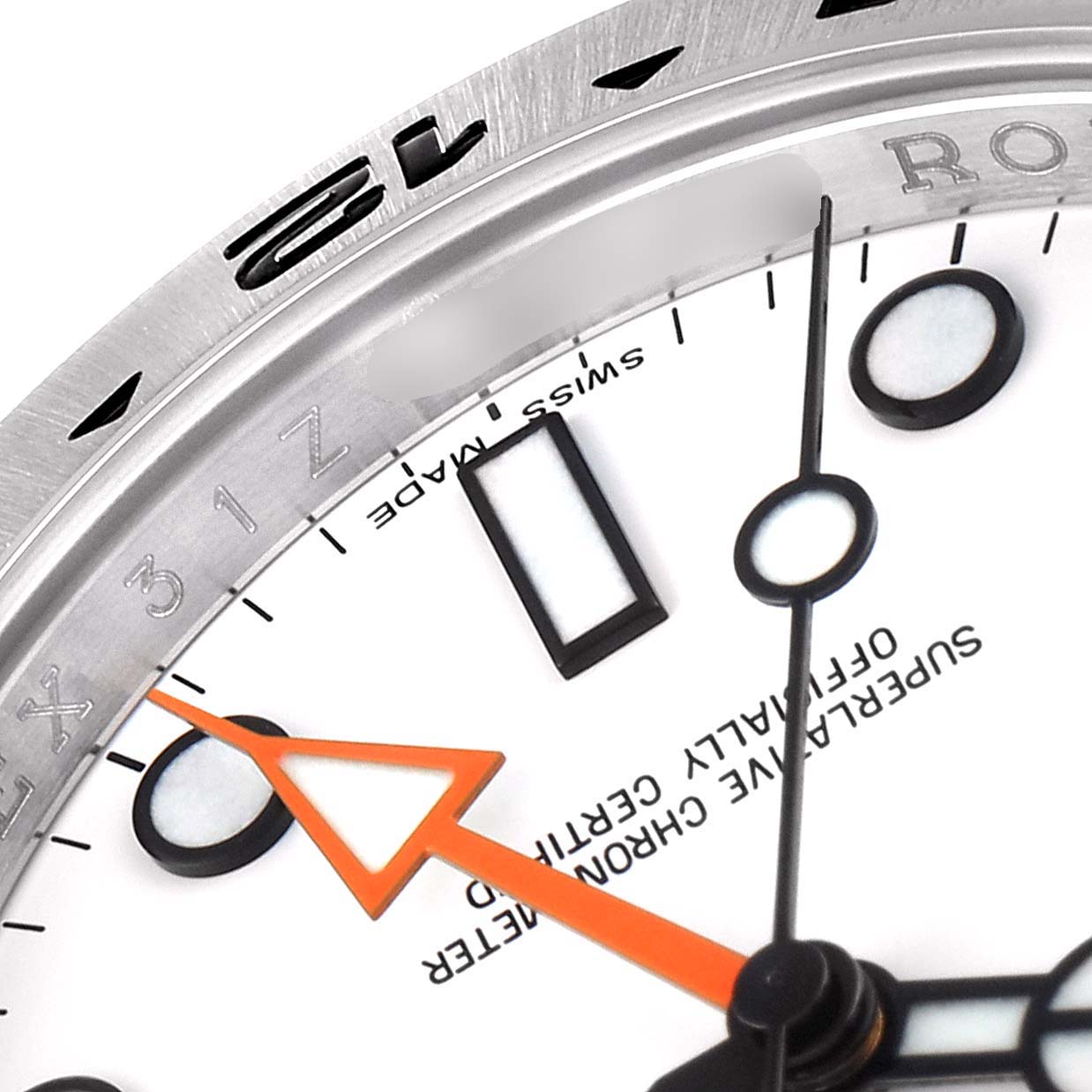 This close-up image shows the dial and hands of the Rolex Explorer 216570 Men
s Stainless Steel White Dial 216570 Men
s Stainless Steel White Dial model, focusing on the bezel and hour markers.