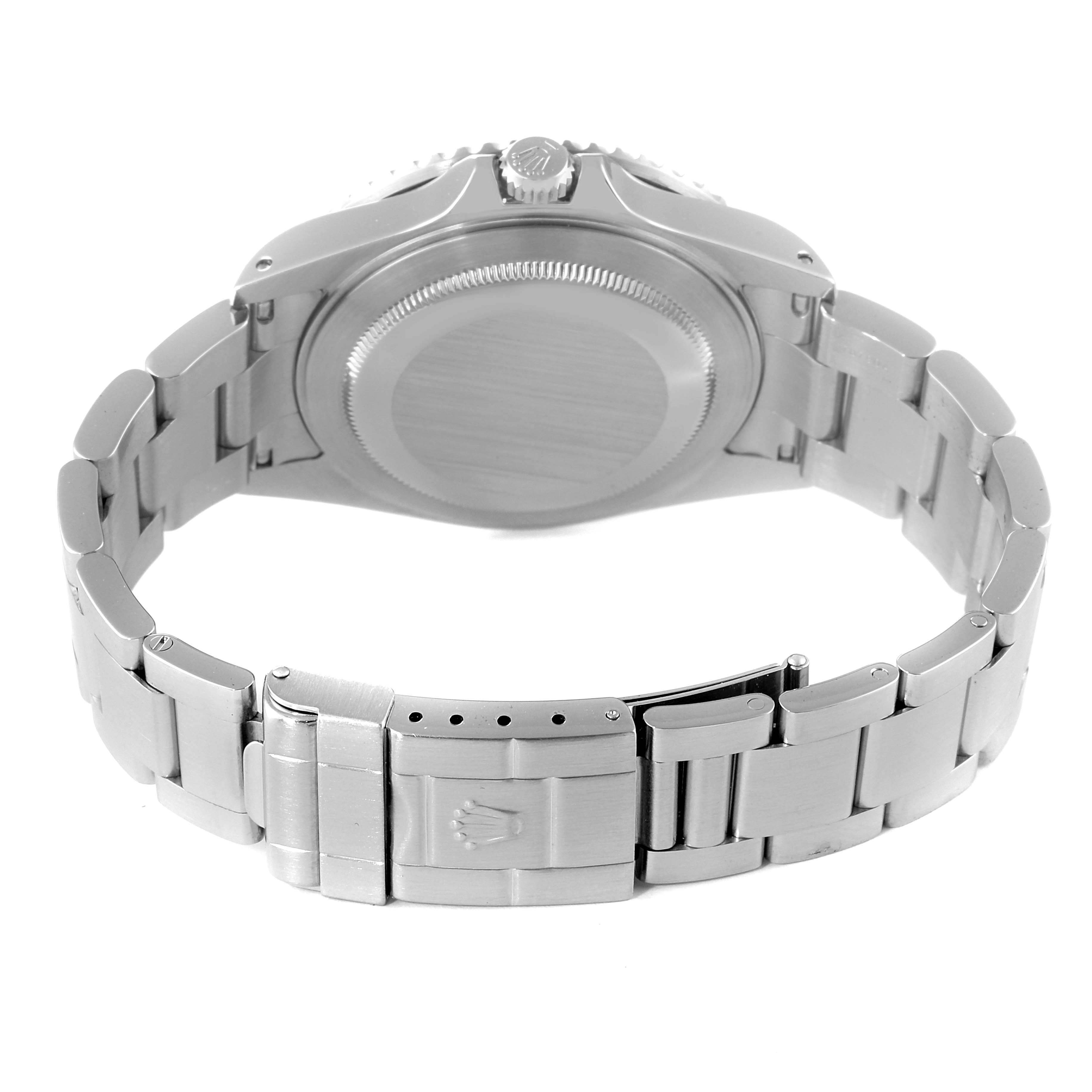 The image shows the back view of a Rolex GMT-Master 16710 Men
s Stainless Steel Black Dial 16710 Men
s Stainless Steel Black Dial watch, highlighting its clasp, bracelet, and case back.