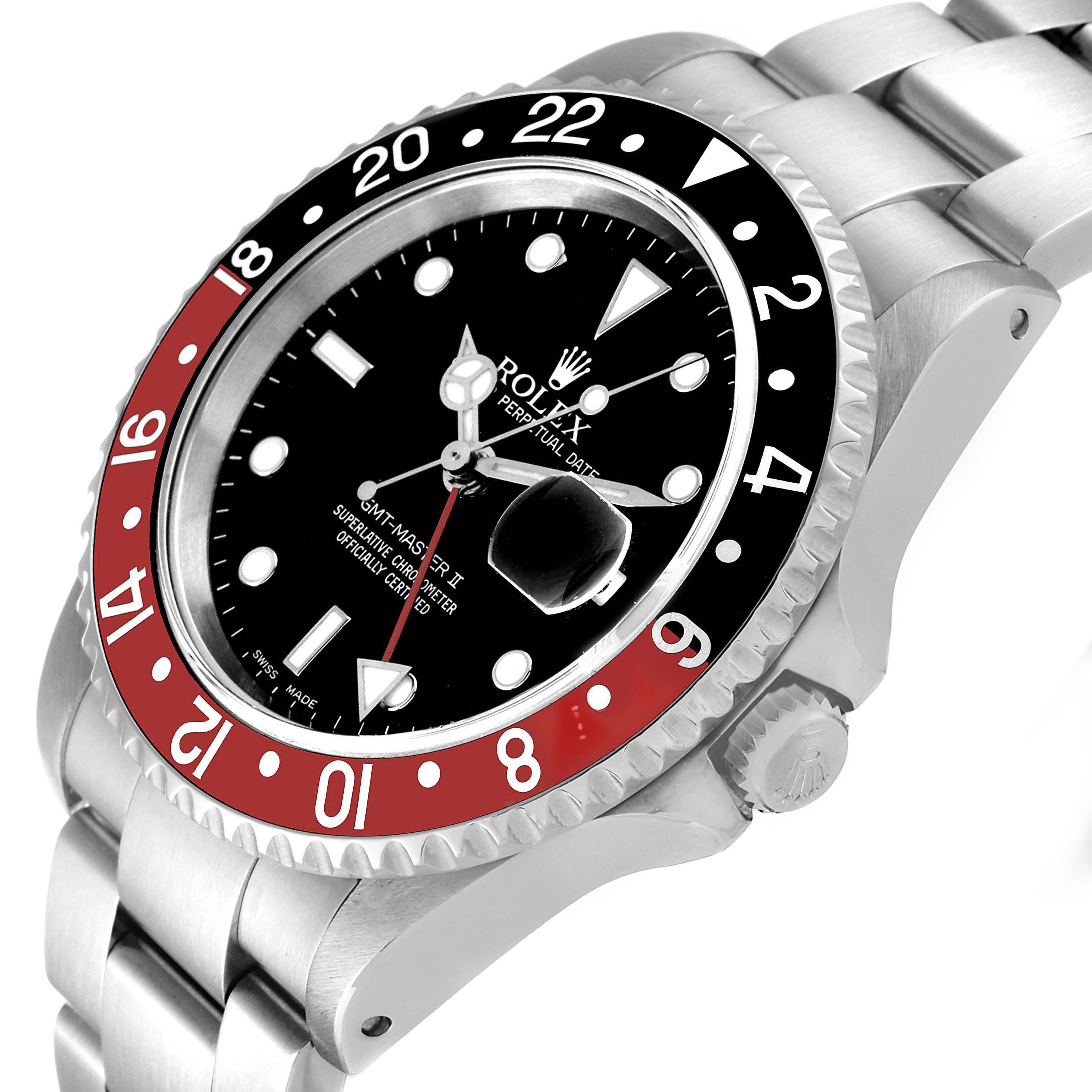 This image shows a close-up of the dial, bezel, and part of the bracelet of the Rolex GMT-Master 16710 Men
s Stainless Steel Black Dial 16710 Men
s Stainless Steel Black Dial II watch.