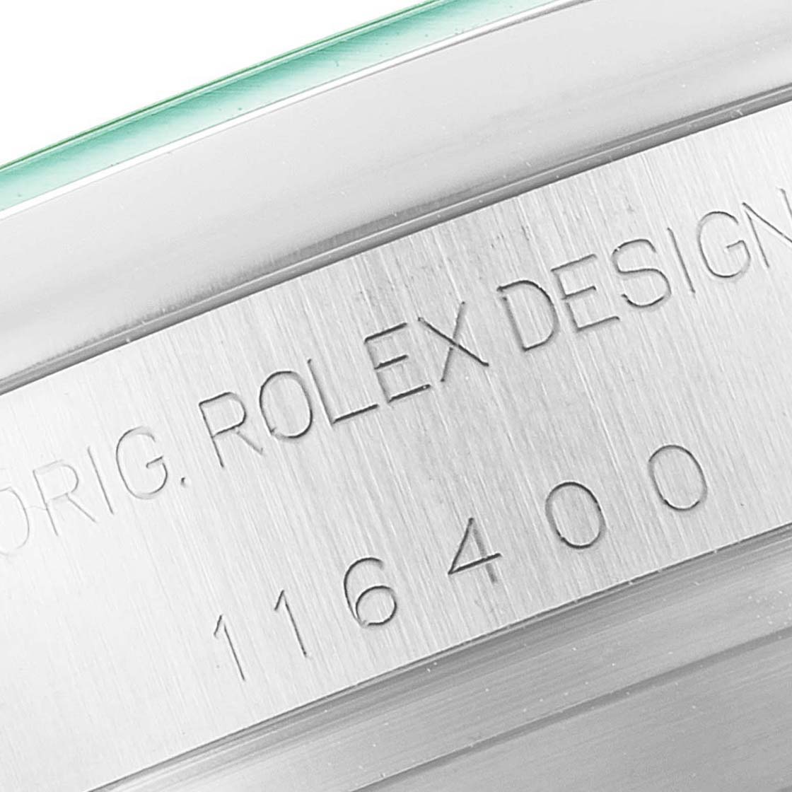 This image shows a close-up of the side of a Rolex Milgauss 116400GV Men
s Stainless Steel Blue Dial 116400GV Men
s Stainless Steel Blue Dial watch, highlighting the engraved model number 116400 and "ROLEX DESIGN."