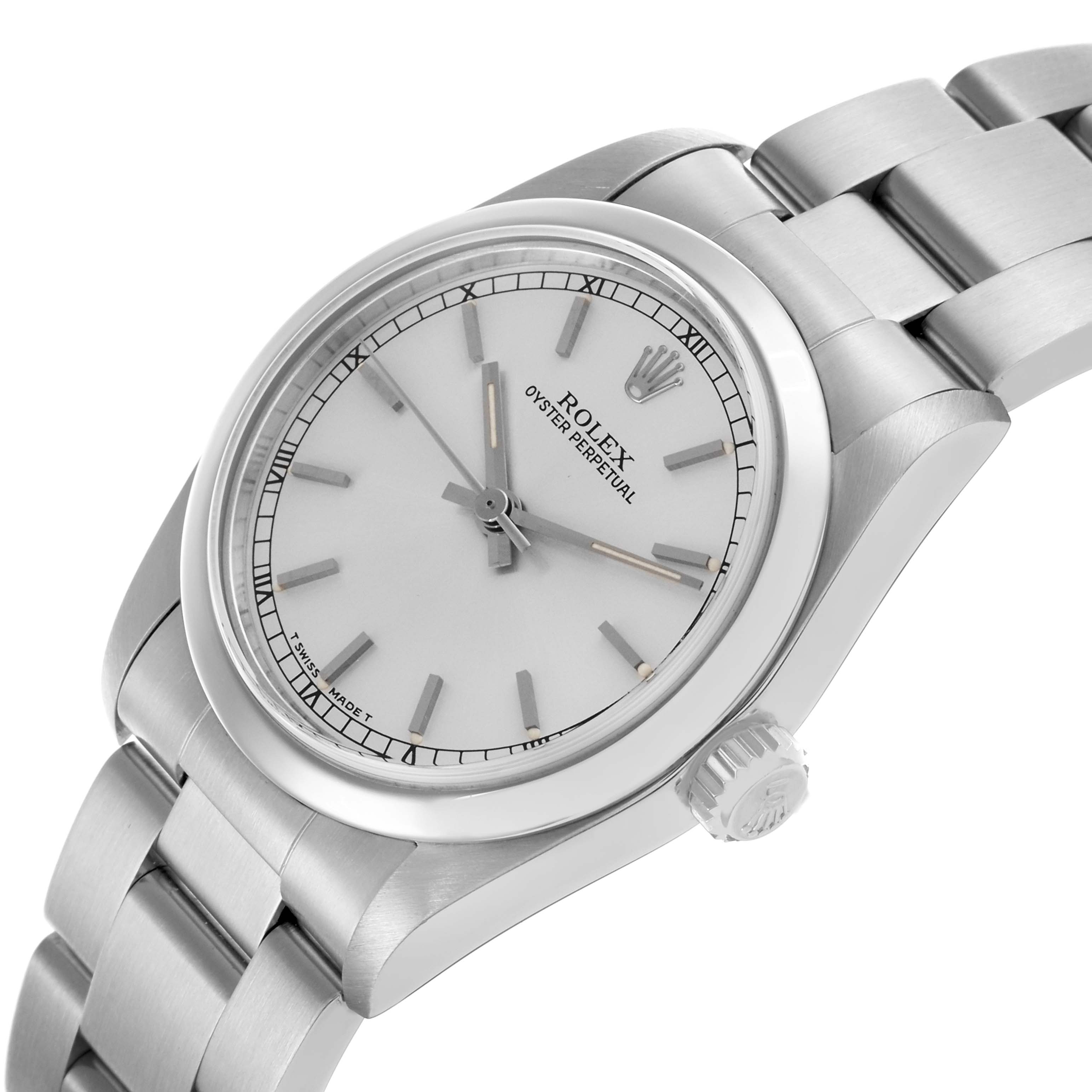 The Rolex Mid-Size 67480 Women's Stainless Steel Silver Dial 67480 Women's Stainless Steel Silver Dial watch is shown at an angled side view, displaying the face, bracelet, and crown.