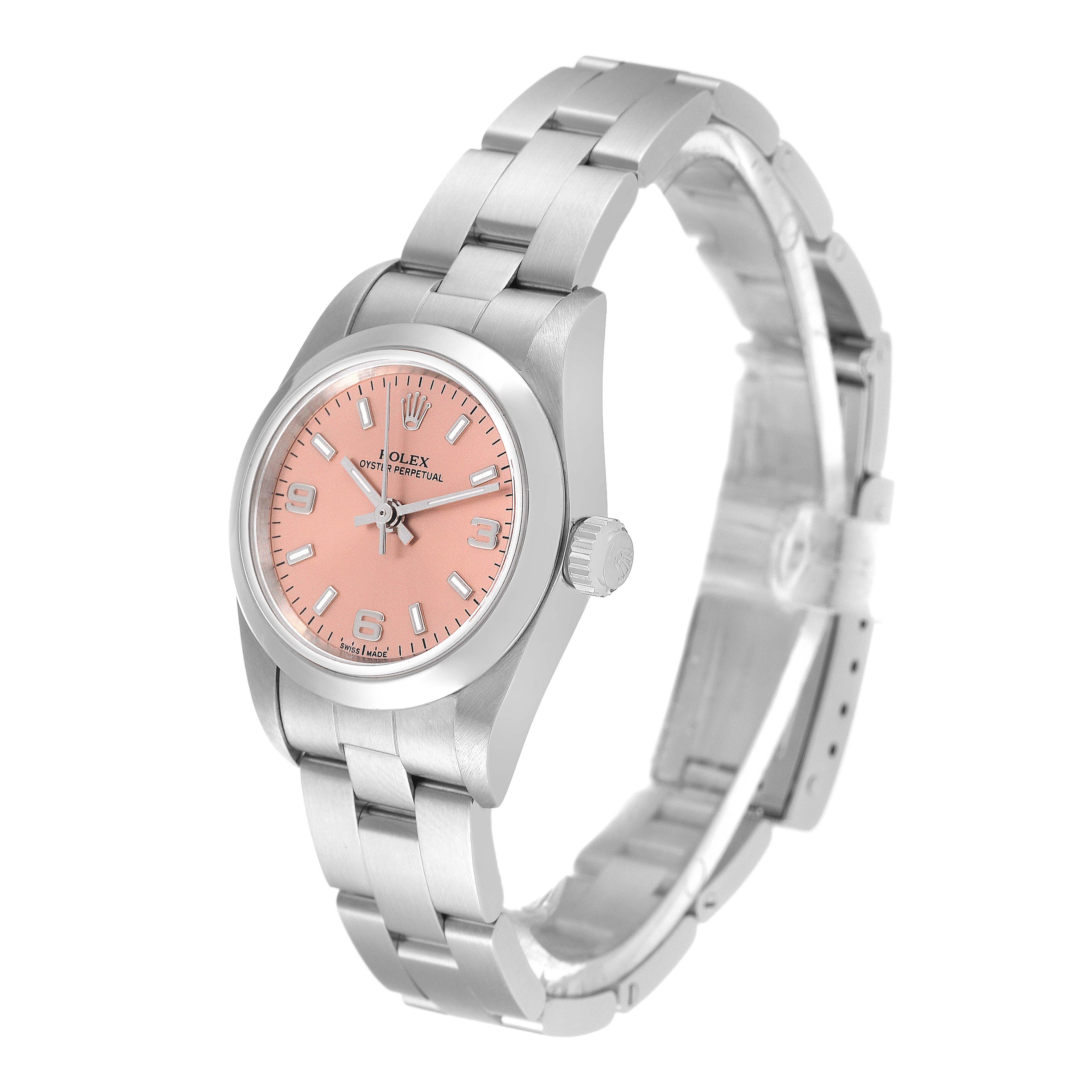 The Rolex Oyster Perpetual 76080 Women
s Stainless Steel Pink Dial 76080 Women
s Stainless Steel Pink Dial watch is shown at a three-quarter angle, highlighting its pink dial, stainless steel case, and bracelet.