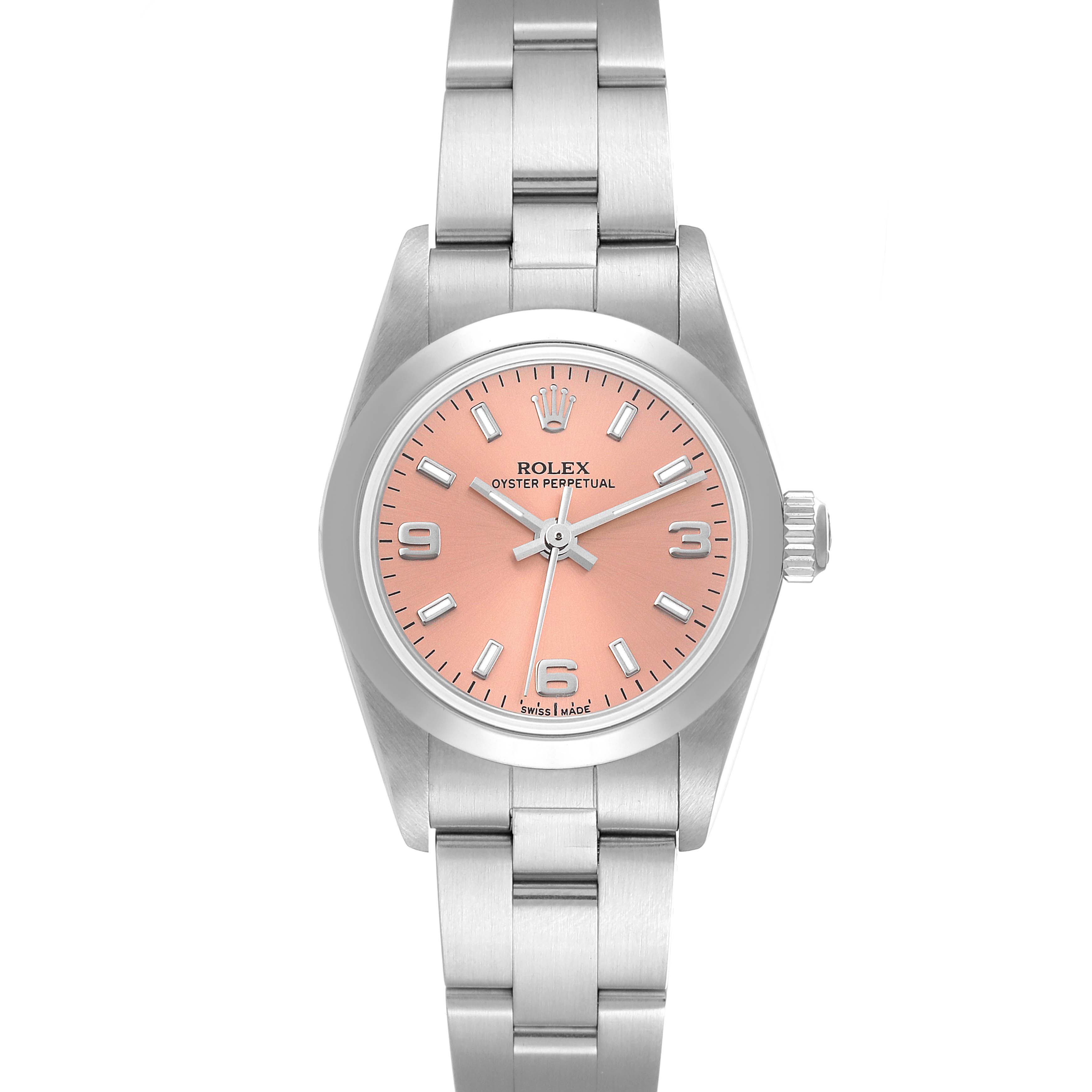 The image shows a front view of a Rolex Oyster Perpetual 76080 Women
s Stainless Steel Pink Dial 76080 Women
s Stainless Steel Pink Dial watch, featuring a pink dial and silver bracelet.