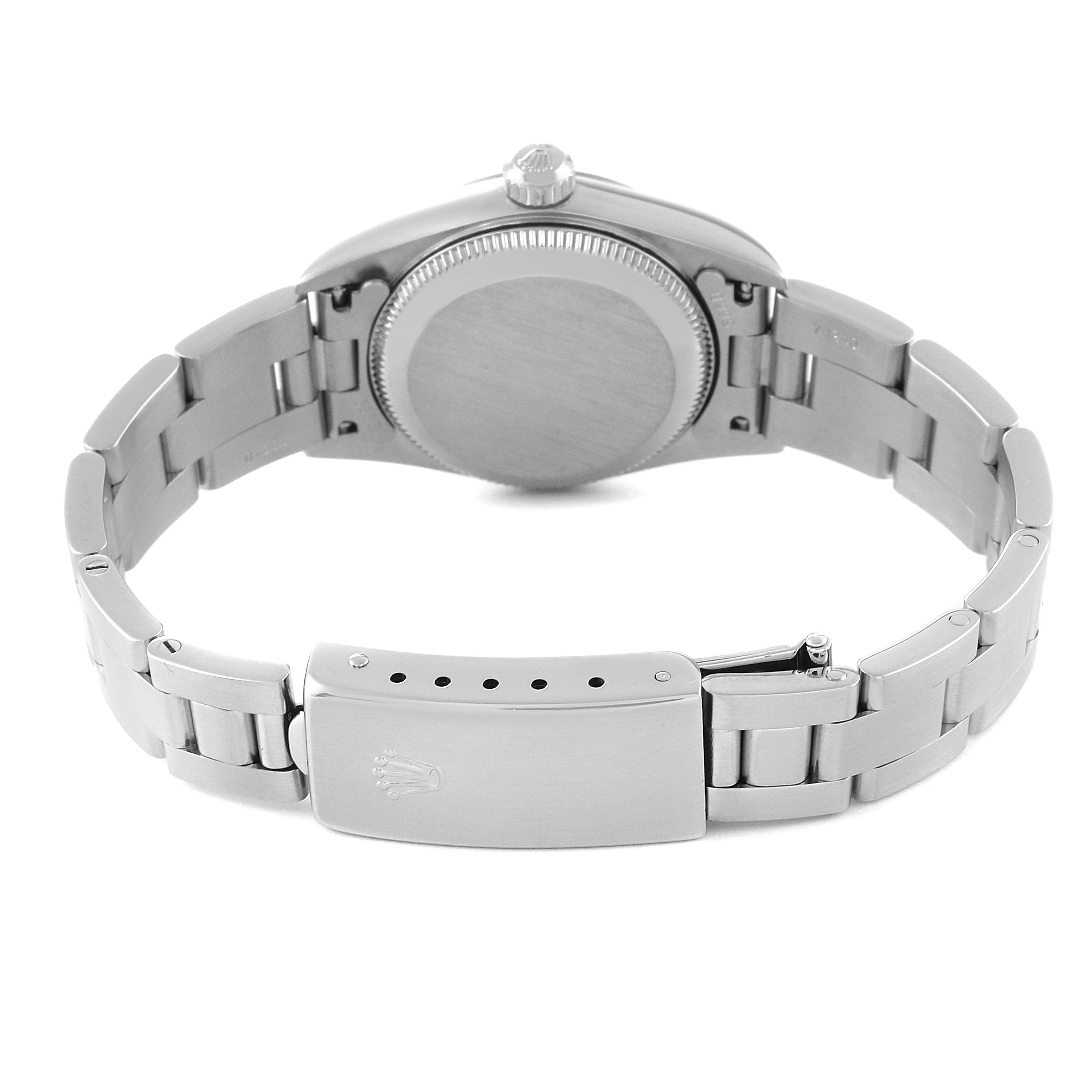 This image shows the backside and clasp of a Rolex Oyster Perpetual 76080 Women
s Stainless Steel Pink Dial 76080 Women
s Stainless Steel Pink Dial watch, focusing on the bracelet and case back.