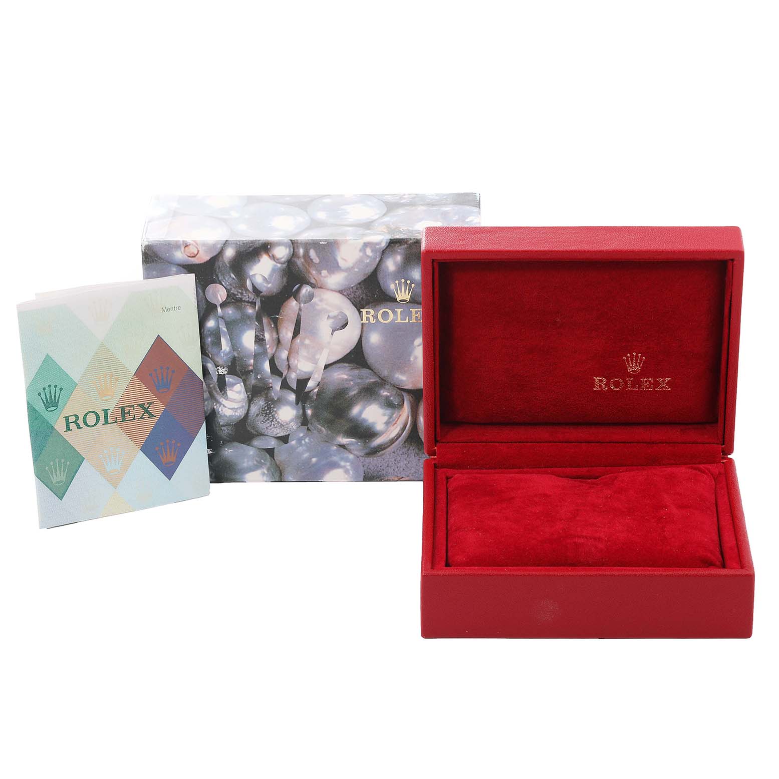 The image shows the box and manuals for a Rolex Oyster Perpetual 76080 Women
s Stainless Steel Pink Dial 76080 Women
s Stainless Steel Pink Dial watch without the actual watch, from a front angle.