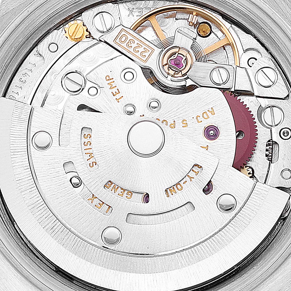 This close-up image shows the movement and intricate inner workings of the Rolex Oyster Perpetual 76193 Women
s Steel and Gold (two tone) Blue Dial 76193 Women
s Steel and Gold (two tone) Blue Dial model.