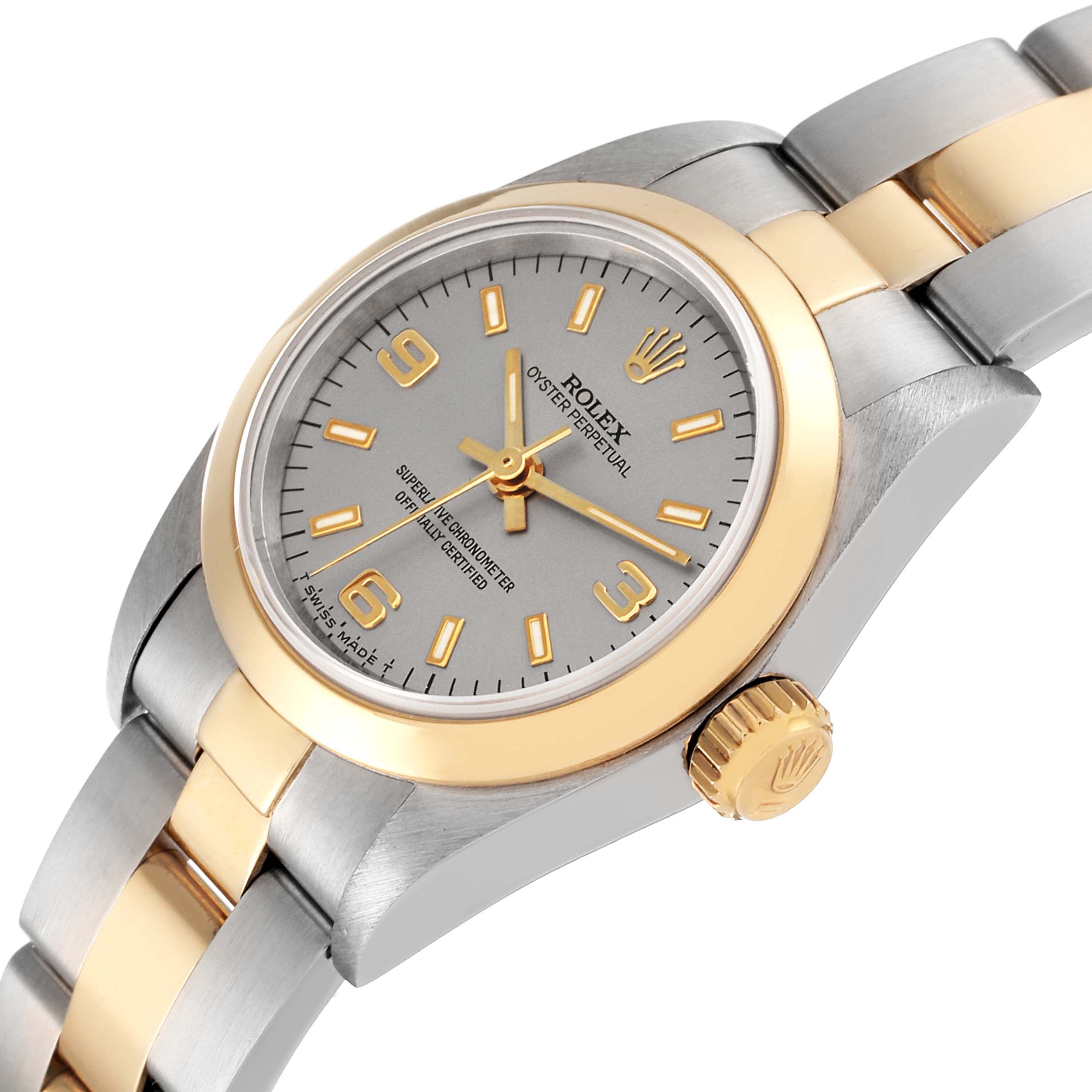 This image shows a side and partial top view of the Rolex Oyster Perpetual 67183 Women's Steel and Gold (two tone) Silver Dial 67183 Women's Steel and Gold (two tone) Silver Dial watch, highlighting the dial, bezel, and bracelet.