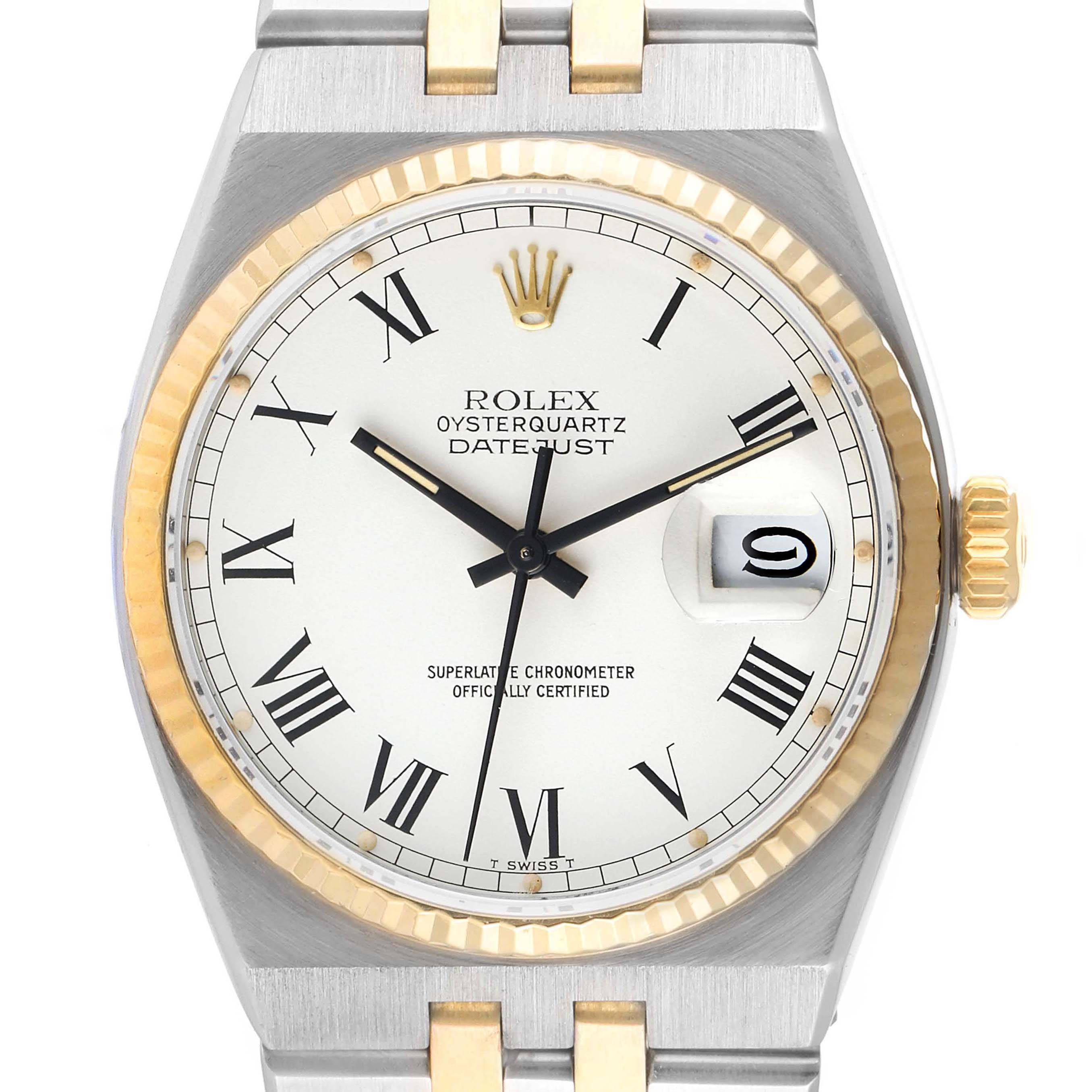 This image shows a frontal view of a Rolex Oysterquartz 17013 Men's Steel and Gold (two tone) White Dial 17013 Men's Steel and Gold (two tone) White Dial Datejust watch, featuring its dial, bezel, crown, and part of the bracelet.