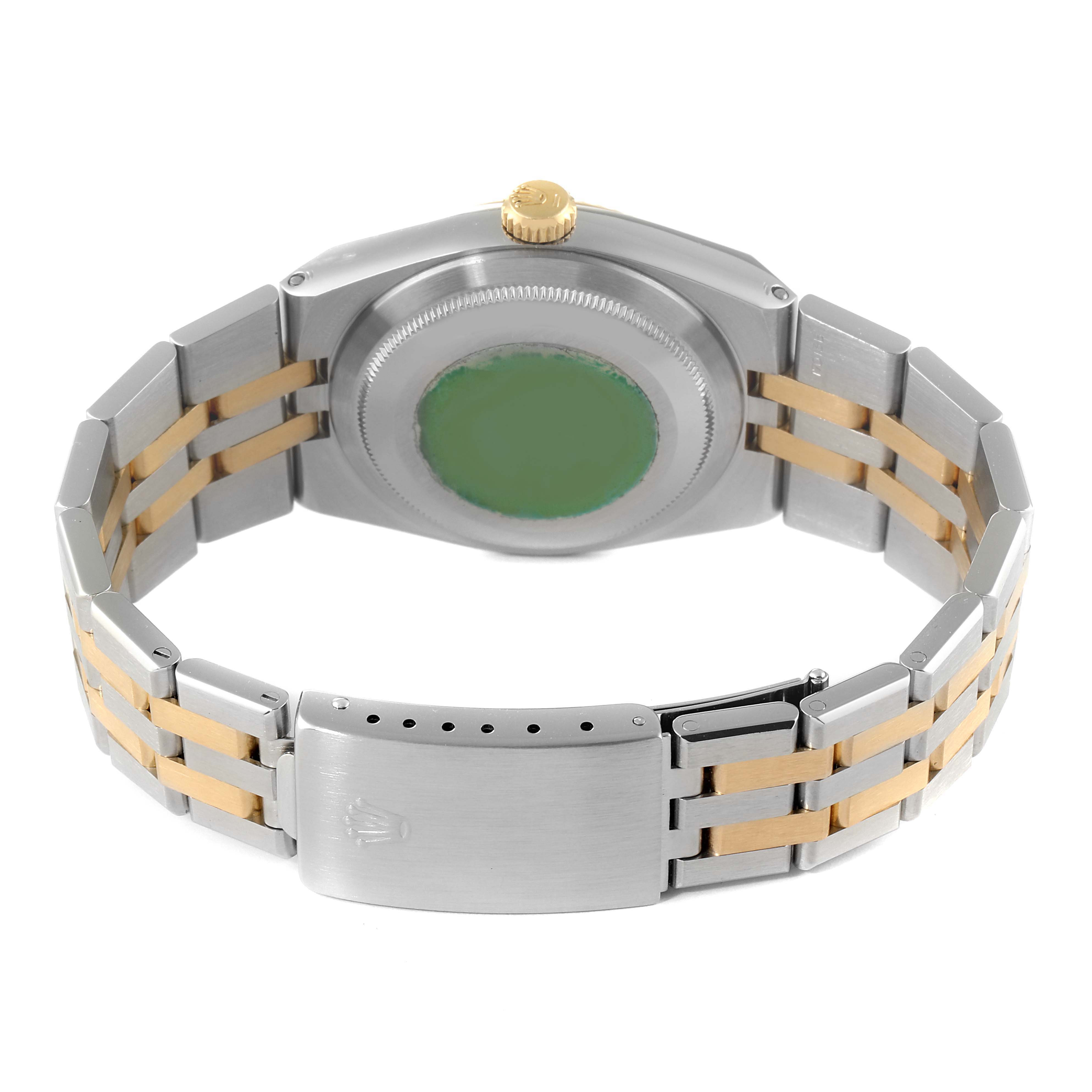 This image shows the back view of a Rolex Oysterquartz 17013 Men's Steel and Gold (two tone) Champagne Dial 17013 Men's Steel and Gold (two tone) Champagne Dial watch, highlighting the case back, crown, and two-tone bracelet with clasp.
