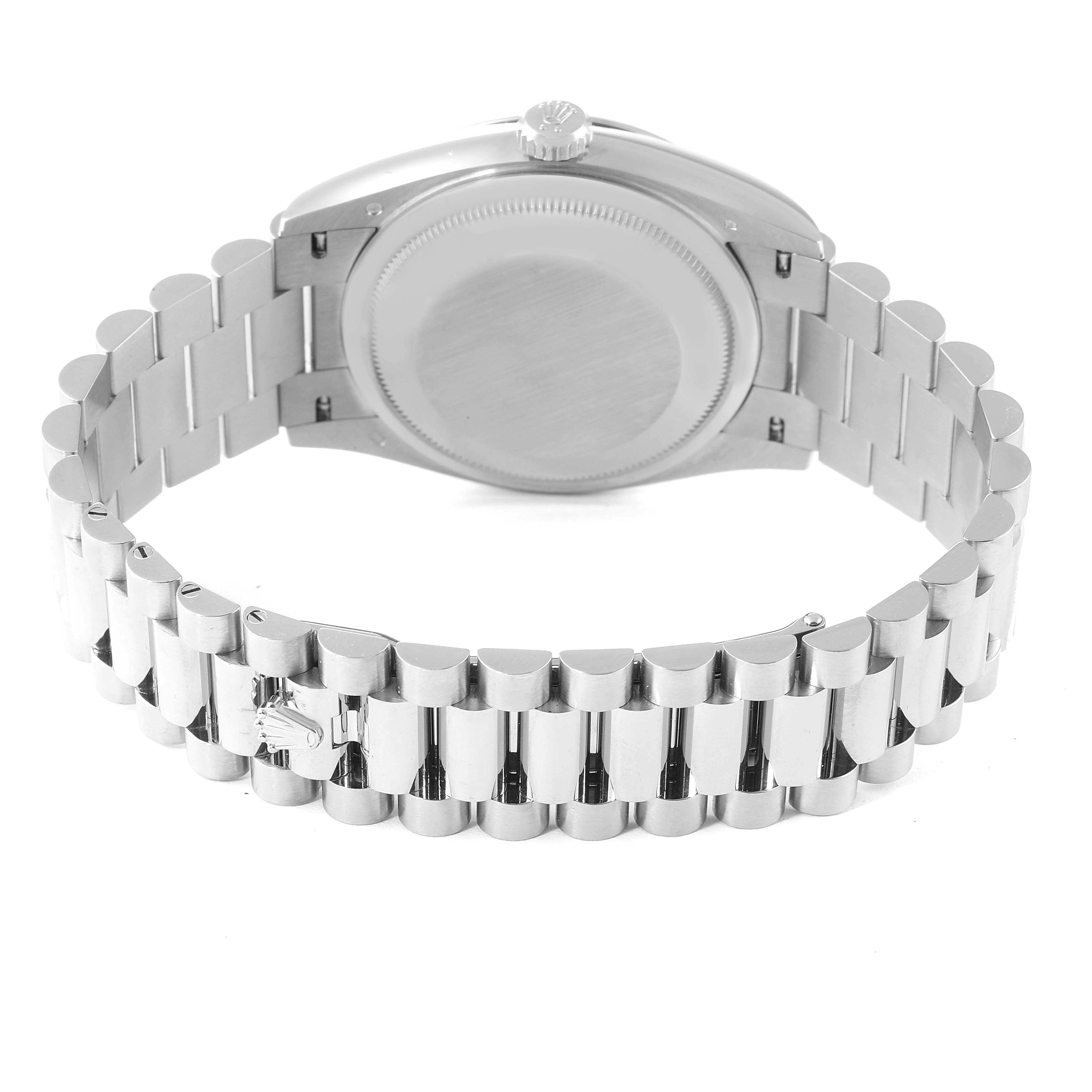 This image shows the back and bracelet of a Rolex President 128239 Men's White Gold Blue Dial 128239 Men's White Gold Blue Dial model watch, focusing on the clasp and case back.