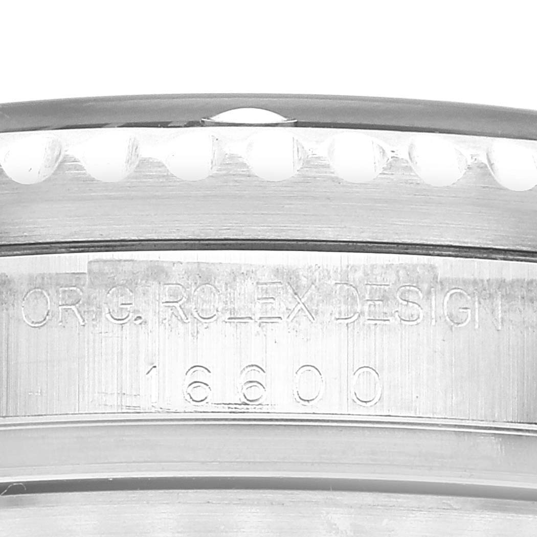 This is a close-up view of the side of a Rolex Sea-Dweller 16600 Men's Stainless Steel Black Dial 16600 Men's Stainless Steel Black Dial watch case, showing the model number 16600 and part of the bezel.