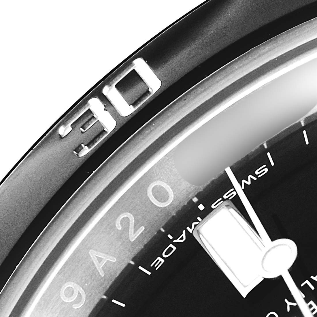 This close-up image shows part of the dial and bezel of a Rolex Submariner 116610 Men
s Stainless Steel Black Dial 116610 Men
s Stainless Steel Black Dial watch, emphasizing the "30" marker and some dial details.