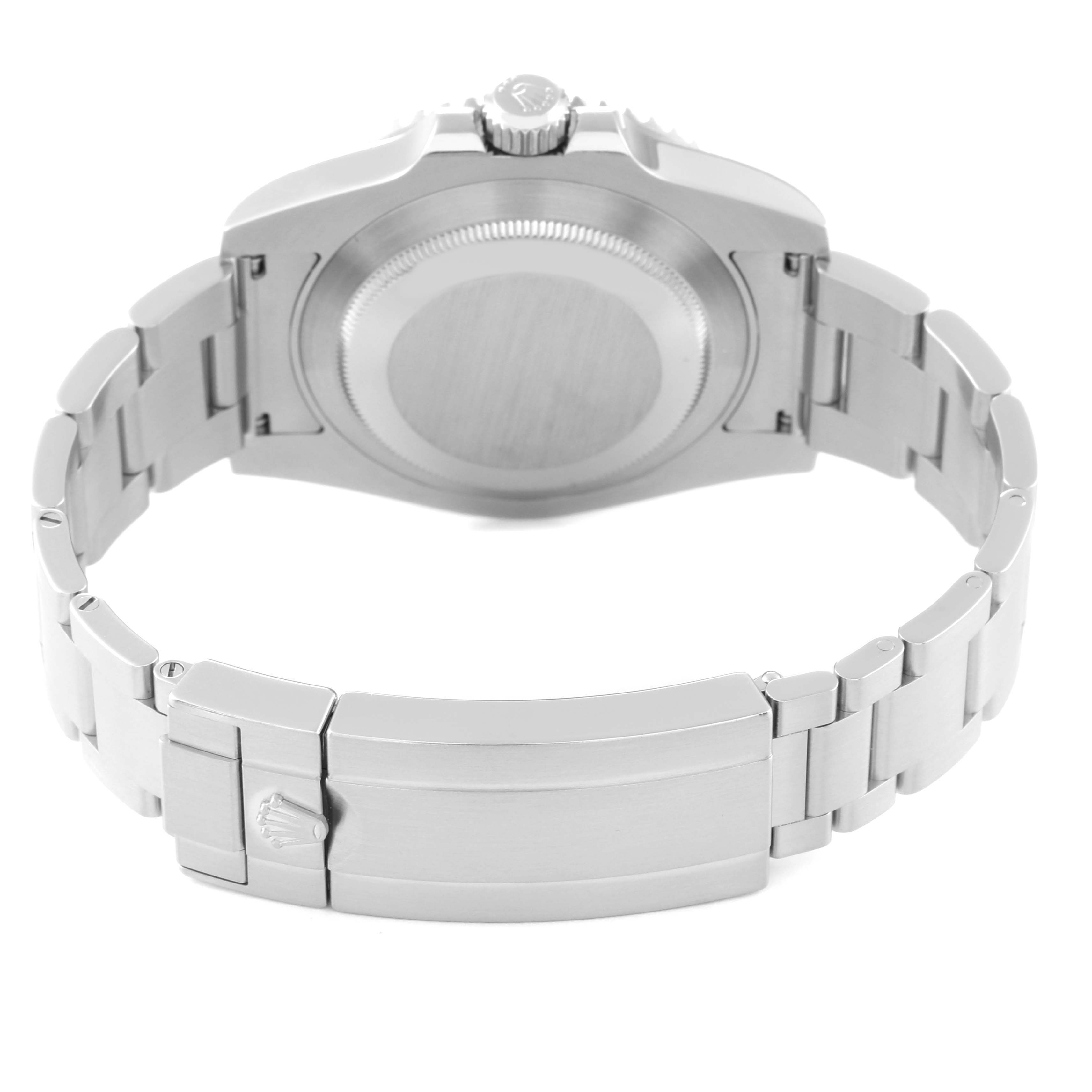 The image shows the back and clasp of a Rolex Submariner 116610LV Men's Stainless Steel Green Dial 116610LV Men's Stainless Steel Green Dial watch viewed from an angle that highlights the bracelet and case back.