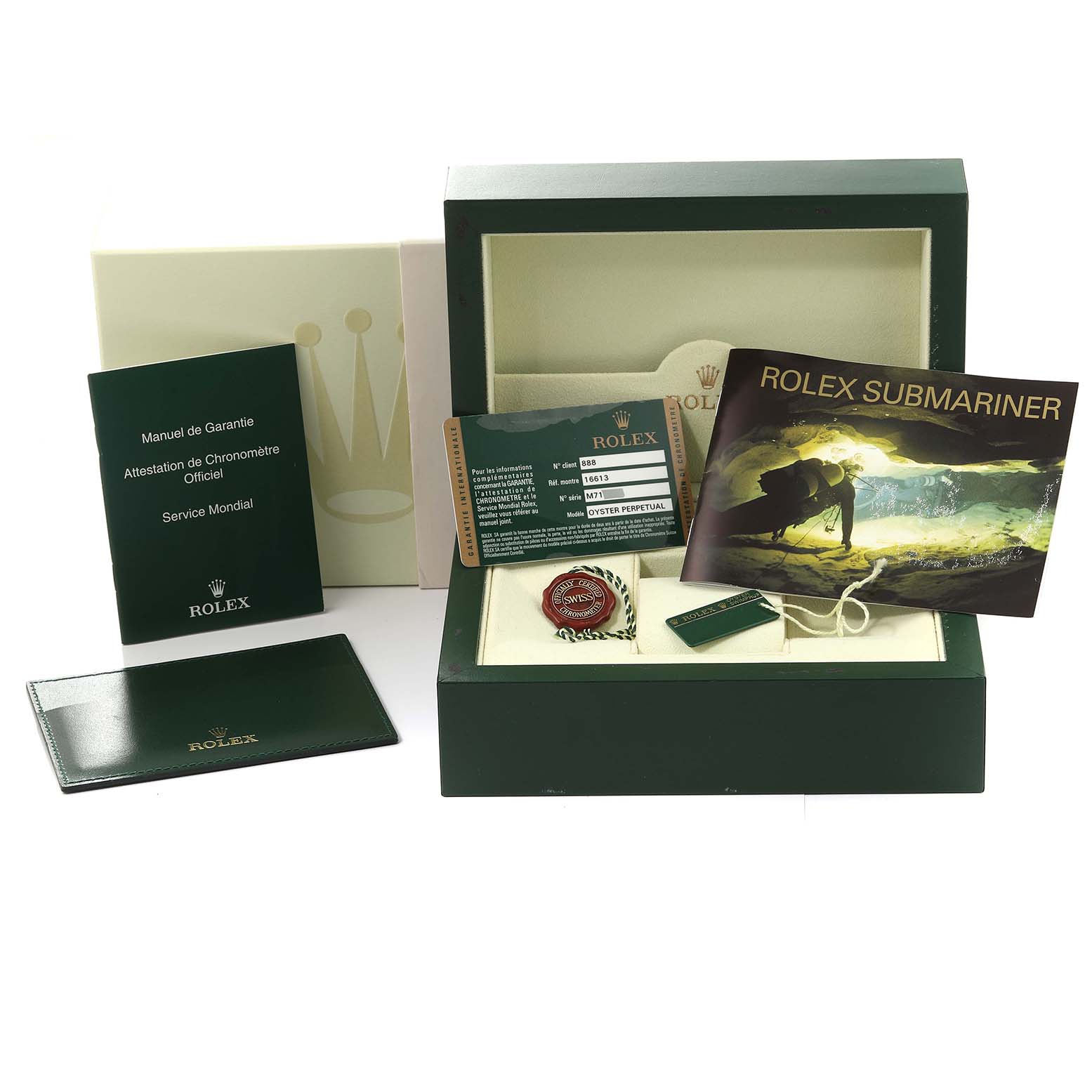 The image shows a Rolex Submariner 16613 Men
s Steel and Gold (two tone) Grey Dial 16613 Men
s Steel and Gold (two tone) Grey Dial watch box with its accompanying papers, manual, tag, and warranty card.