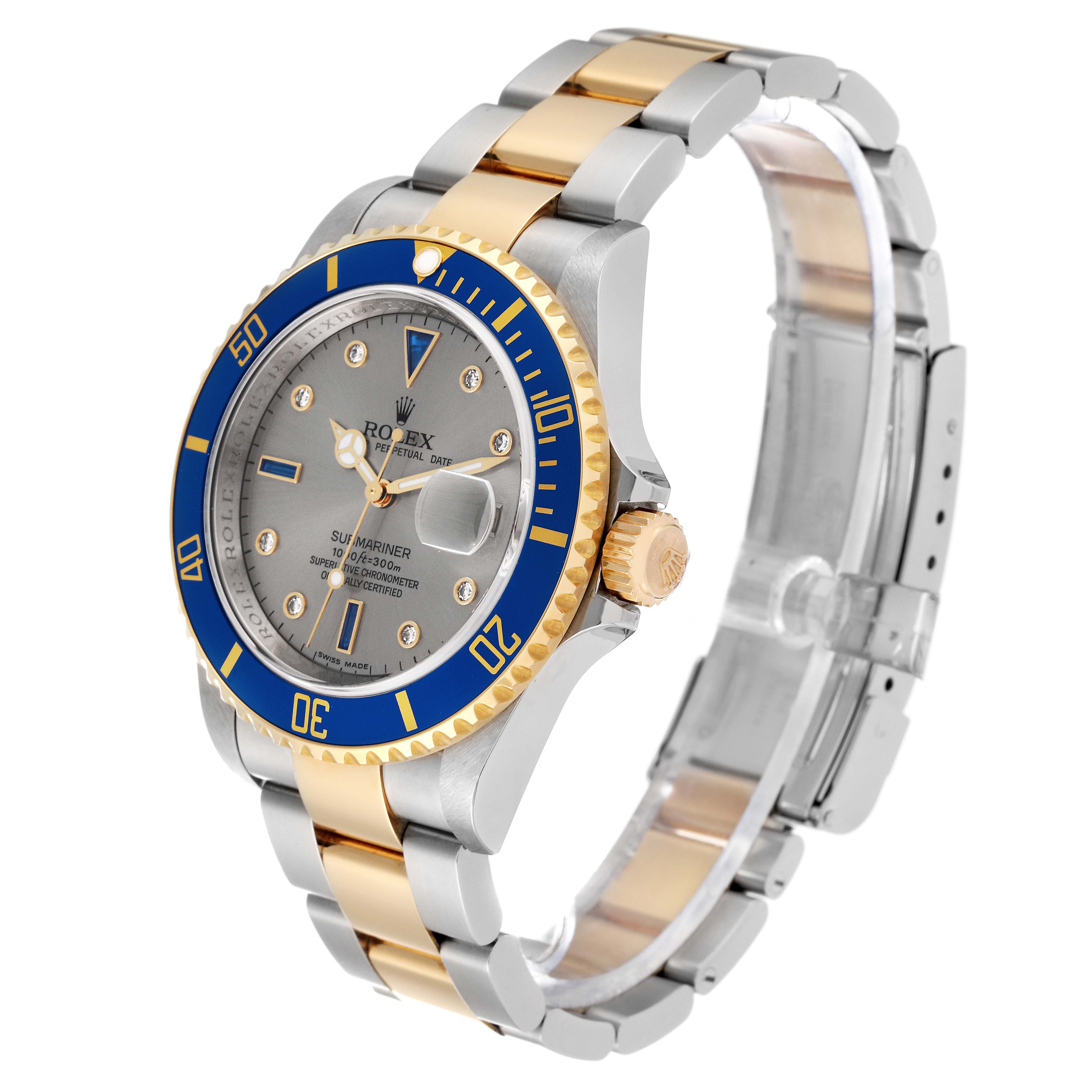 The image shows a side-angle view of a Rolex Submariner 16613 Men
s Steel and Gold (two tone) Grey Dial 16613 Men
s Steel and Gold (two tone) Grey Dial watch, highlighting its two-tone metal bracelet and blue bezel.