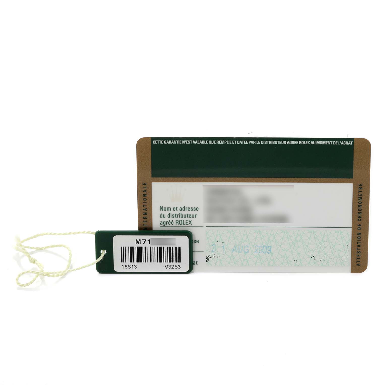 The image shows a warranty card and tag for the Rolex Submariner 16613 Men
s Steel and Gold (two tone) Grey Dial 16613 Men
s Steel and Gold (two tone) Grey Dial, displayed flat with the front visible.