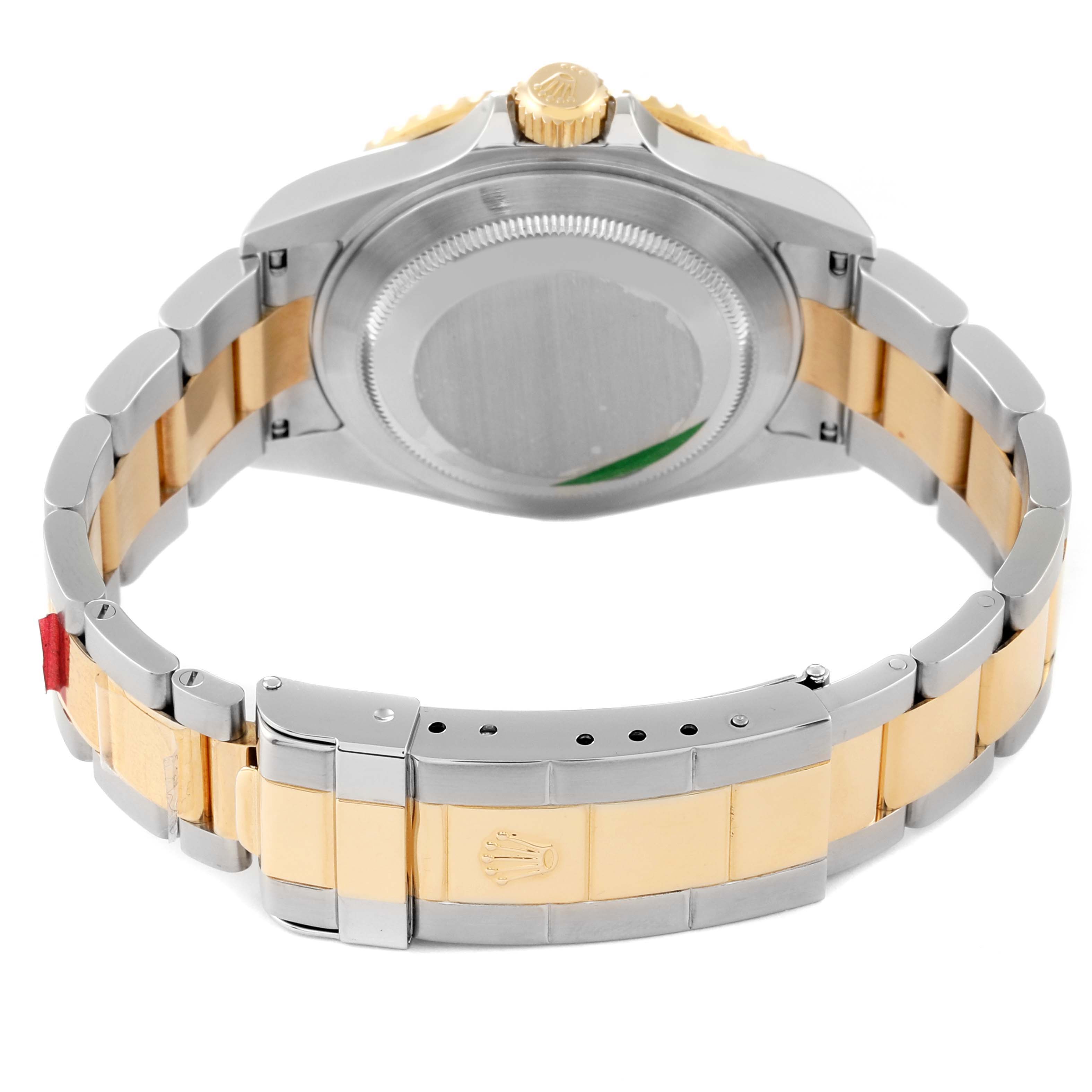 The image shows the back case and bracelet of a Rolex Submariner 16613 Men
s Steel and Gold (two tone) Grey Dial 16613 Men
s Steel and Gold (two tone) Grey Dial watch, highlighting its two-tone metal design.