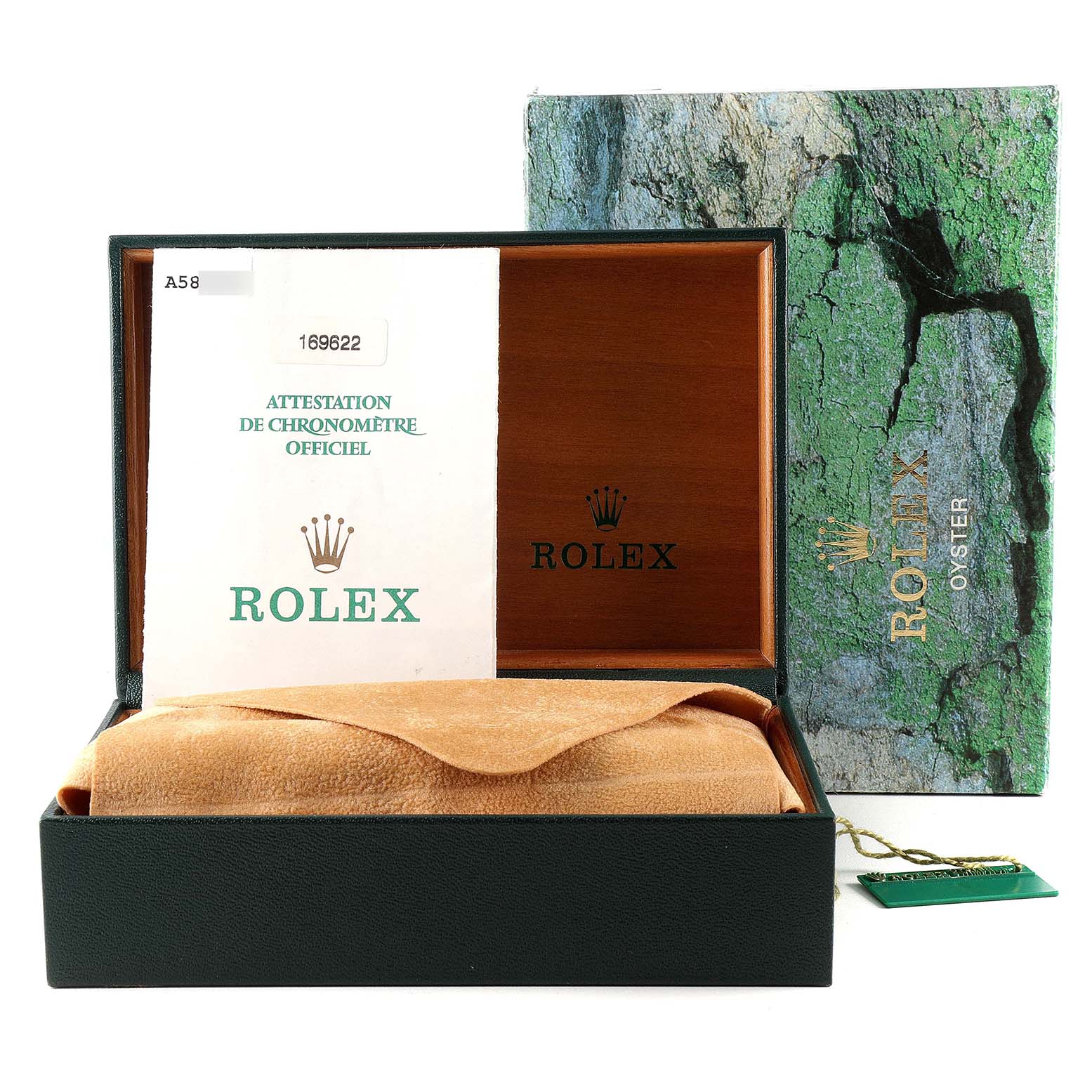 This image shows the packaging and certification for a Rolex Yacht-Master 169622 Women
s Stainless Steel Silver Dial 169622 Women
s Stainless Steel Silver Dial watch, including the box, documents, and a tag.