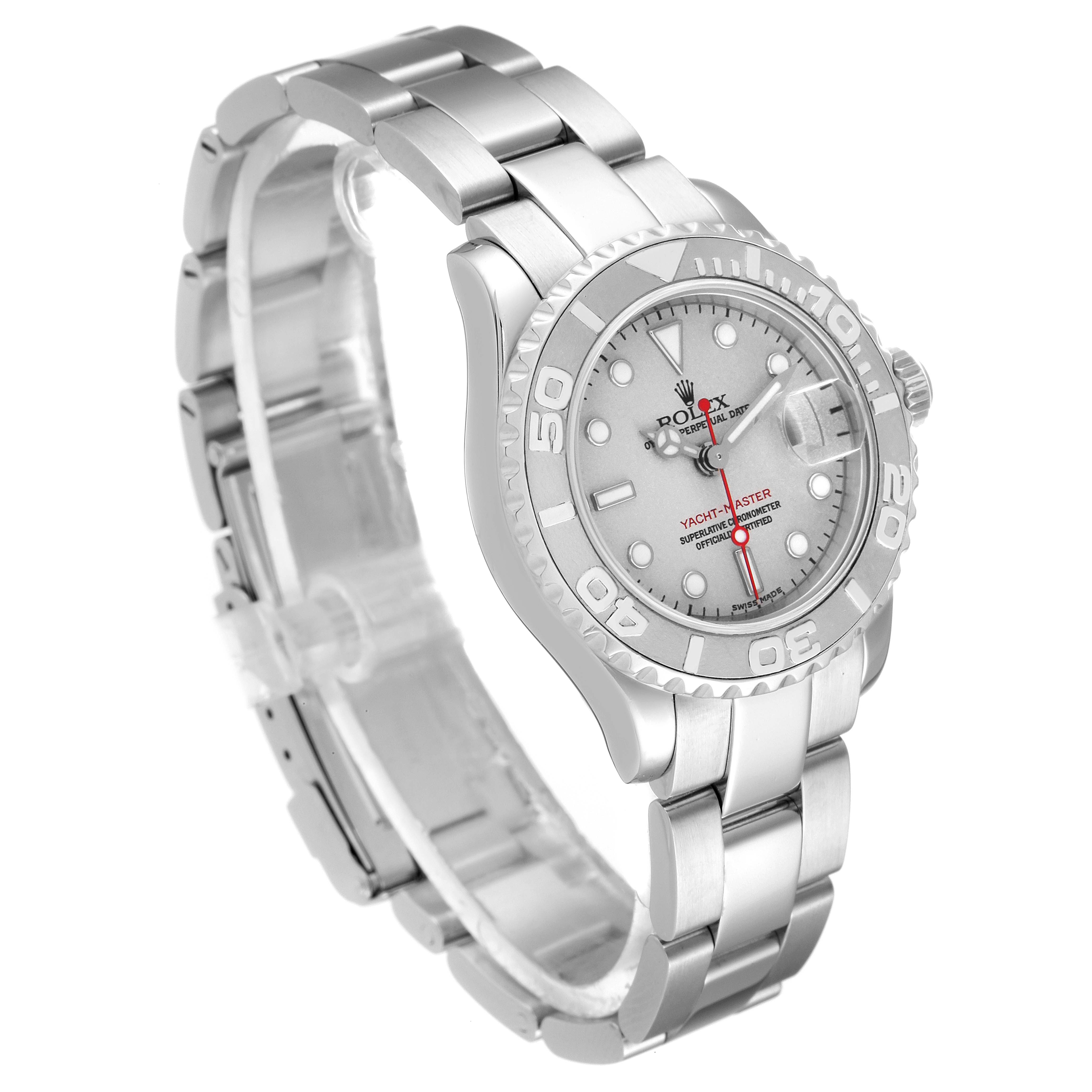 The image shows a side angle view of the Rolex Yacht-Master 169622 Women
s Stainless Steel Silver Dial 169622 Women
s Stainless Steel Silver Dial watch highlighting the face, bezel, bracelet, and clasp.