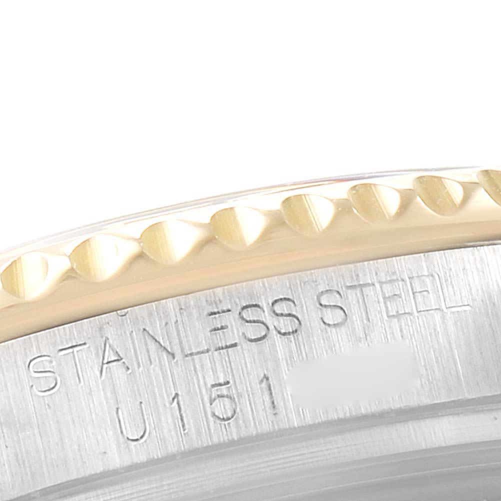 The image shows a close-up of the side of a Rolex Yacht-Master 168623 Men's Steel and Gold (two tone) Grey Dial 168623 Men's Steel and Gold (two tone) Grey Dial watch, highlighting its stainless steel case and bezel.