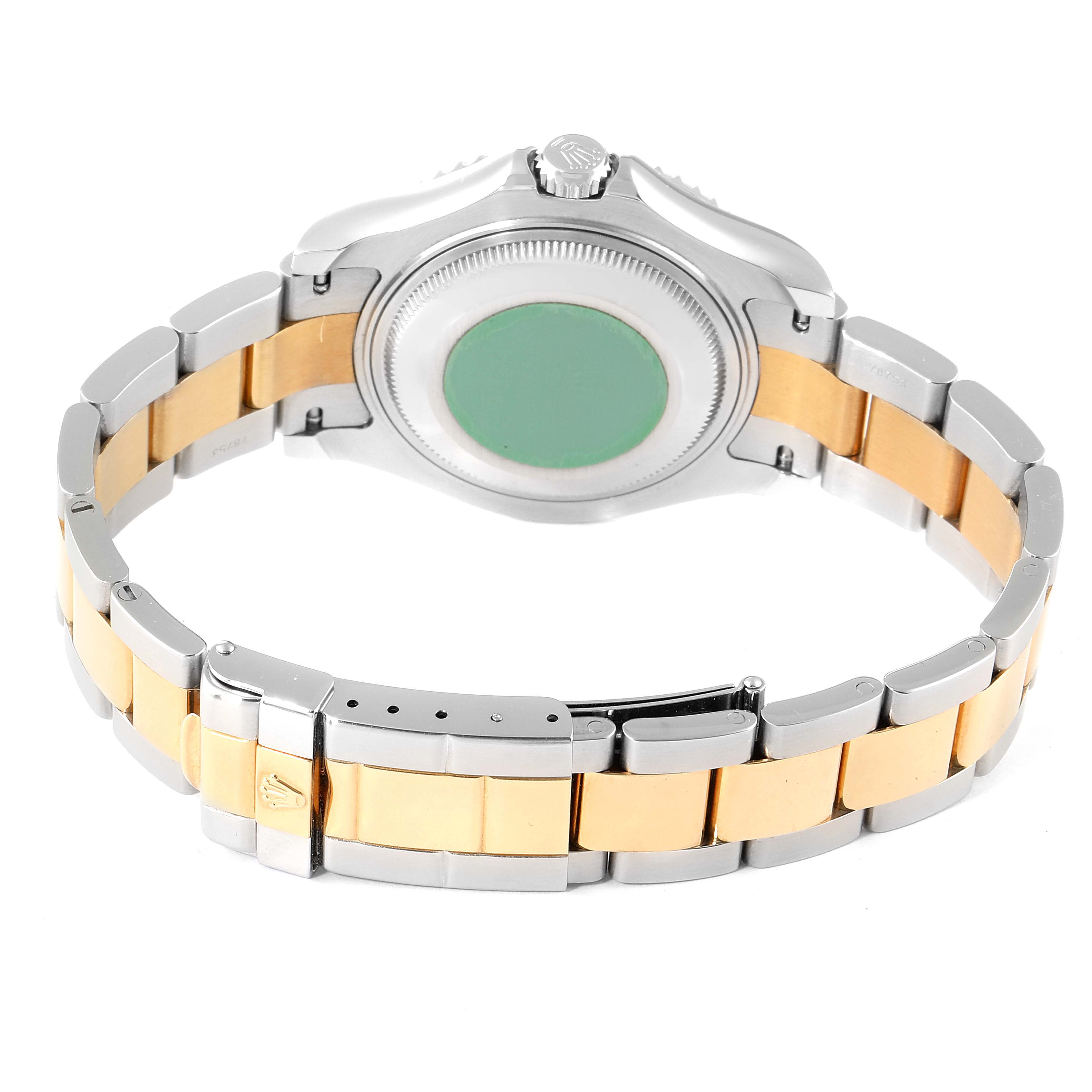 The image shows the back and bracelet of a Rolex Yacht-Master 168623 Men
s Steel and Gold (two tone) Grey Dial 168623 Men
s Steel and Gold (two tone) Grey Dial watch at a slight angle.