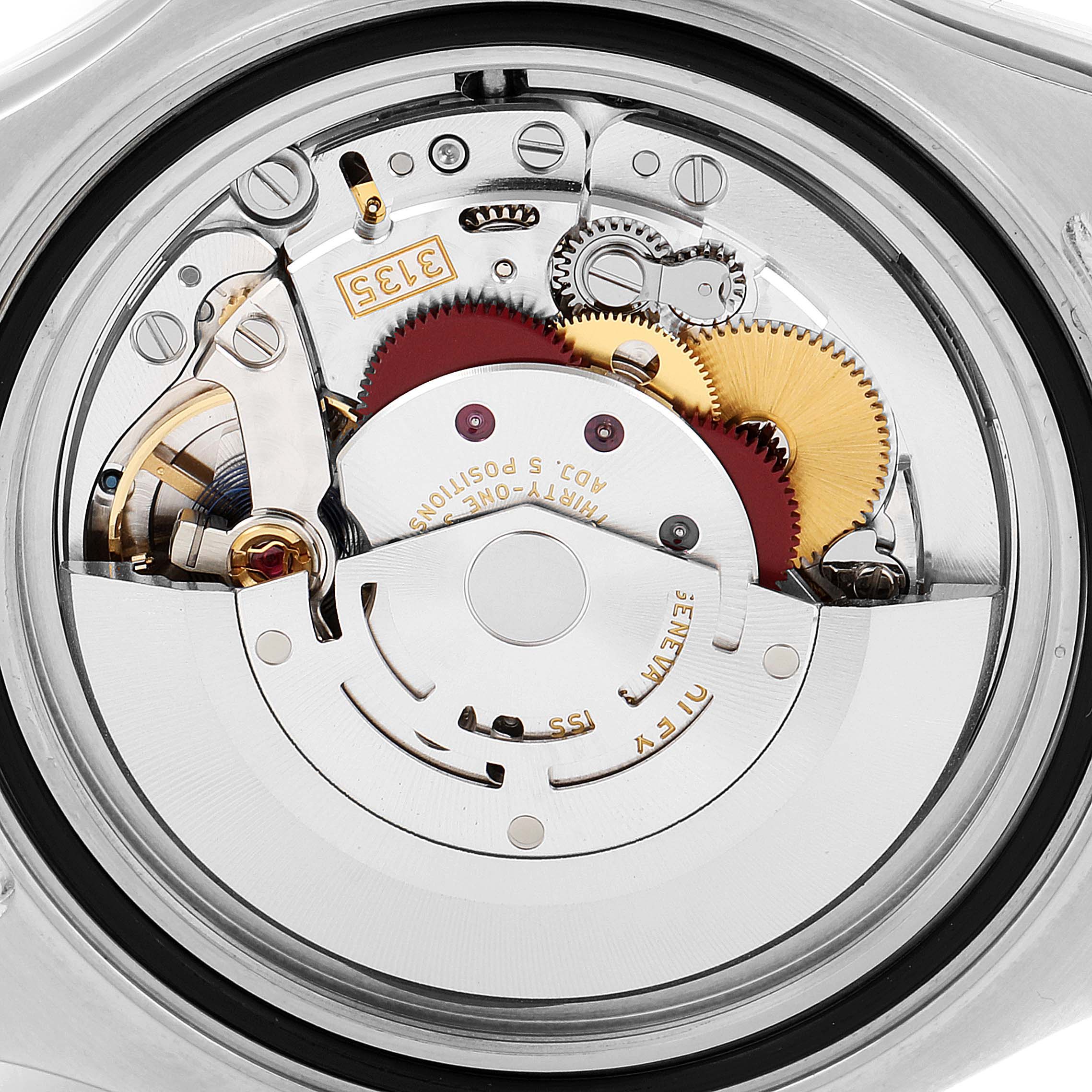 This image shows a close-up view of the movement mechanism inside a Rolex Yacht-Master 116622 Men
s Stainless Steel Blue Dial 116622 Men
s Stainless Steel Blue Dial watch.