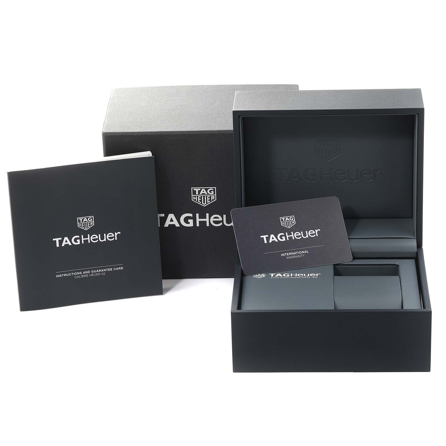 The image shows the packaging, warranty card, and instruction booklet for the Tag Heuer Carrera CBN2010.BA0642 Men's Stainless Steel Black Dial CBN2010.BA0642 Men's Stainless Steel Black Dial watch.