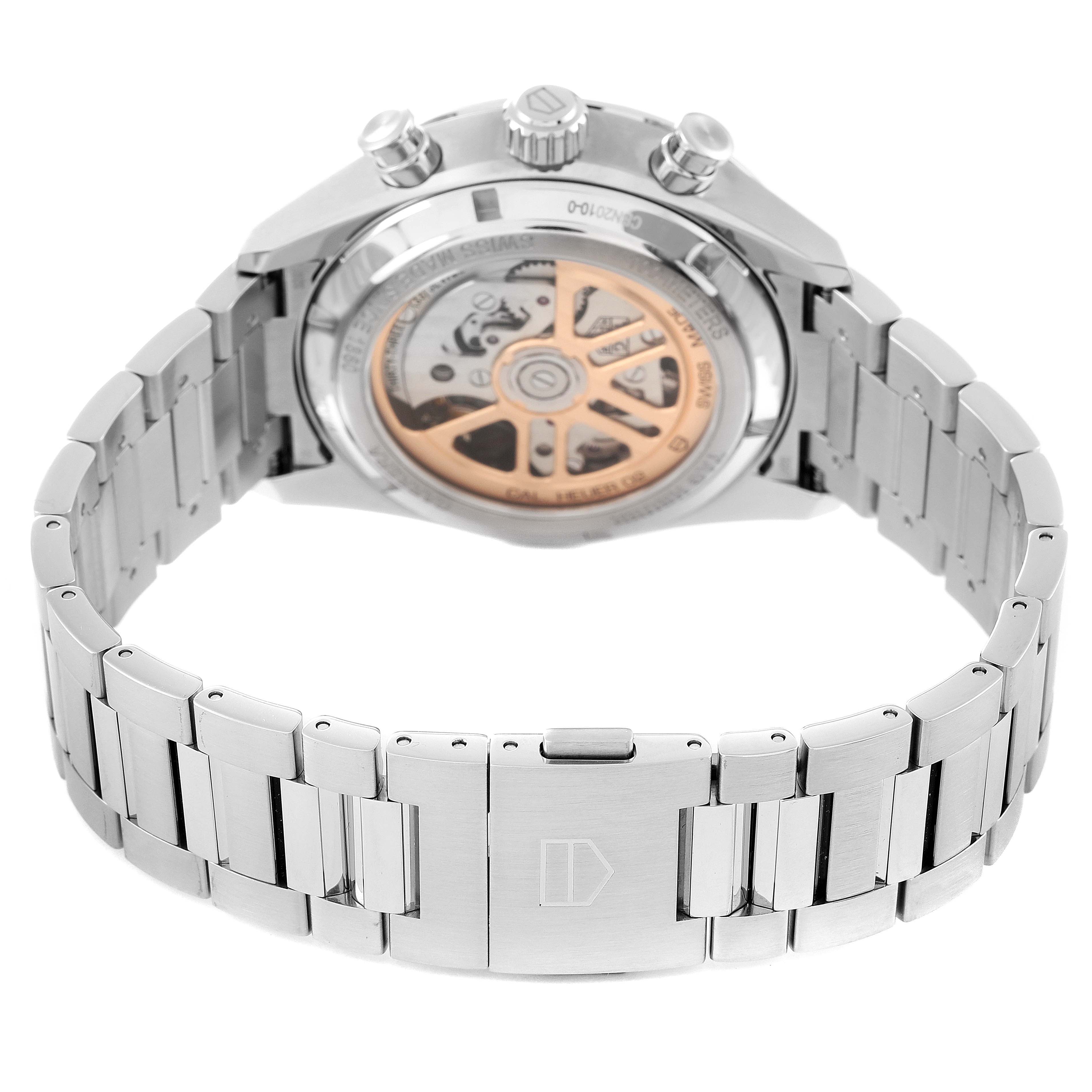 The image shows the Tag Heuer Carrera CBN2010.BA0642 Men's Stainless Steel Black Dial CBN2010.BA0642 Men's Stainless Steel Black Dial watch from the back, highlighting the metal bracelet and visible internal mechanism.