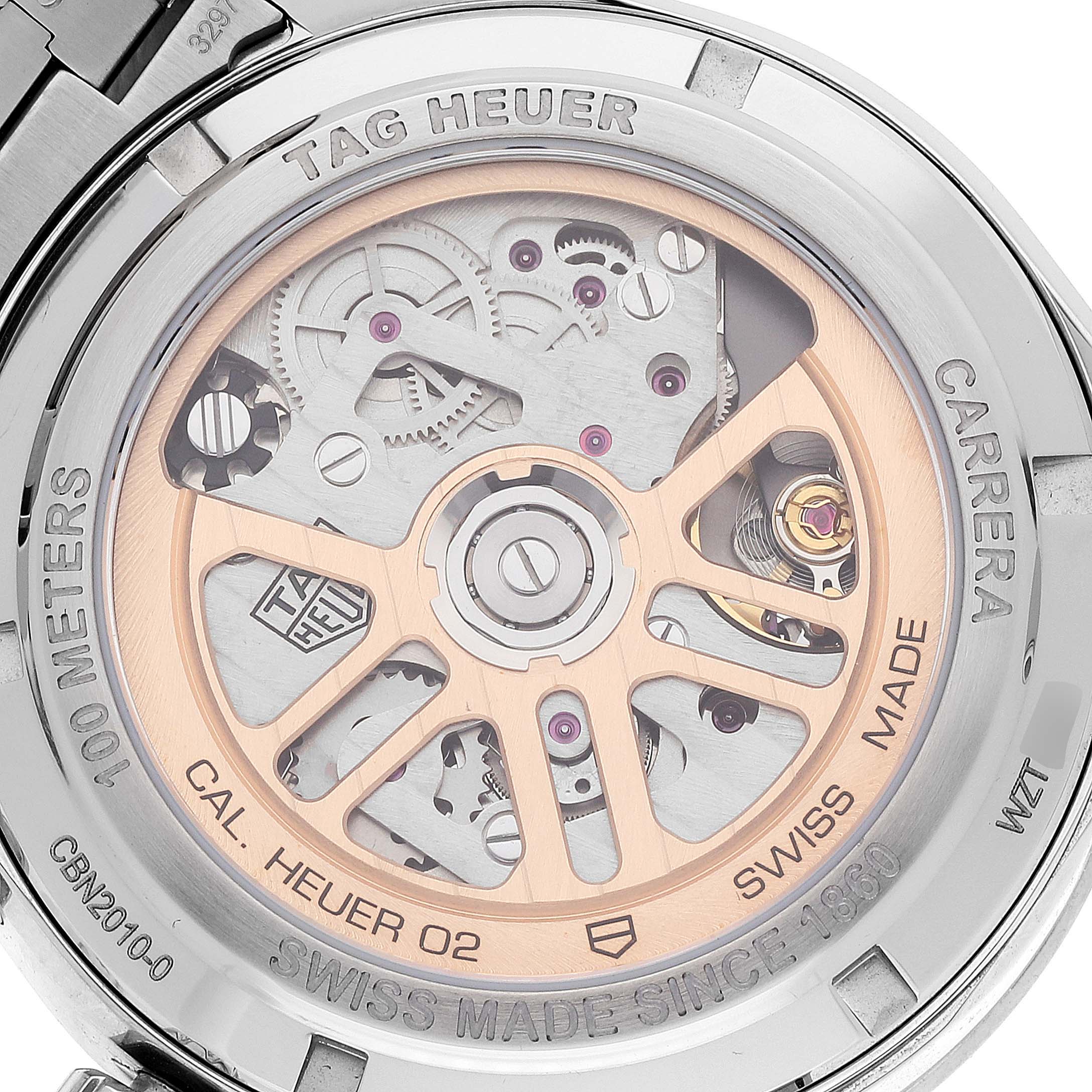 This image shows the back of a Tag Heuer Carrera CBN2010.BA0642 Men's Stainless Steel Black Dial CBN2010.BA0642 Men's Stainless Steel Black Dial watch, revealing its mechanical movement and rotor.