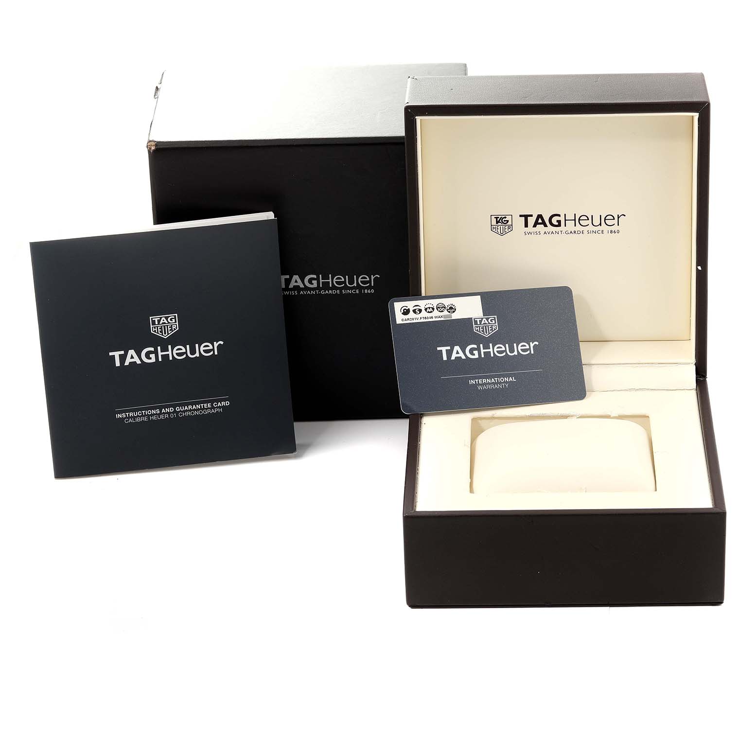 The image shows the watch box, warranty card, and instruction manual for the Tag Heuer Carrera CAR201V.FT6046 Men's Stainless Steel Black Dial CAR201V.FT6046 Men's Stainless Steel Black Dial model.