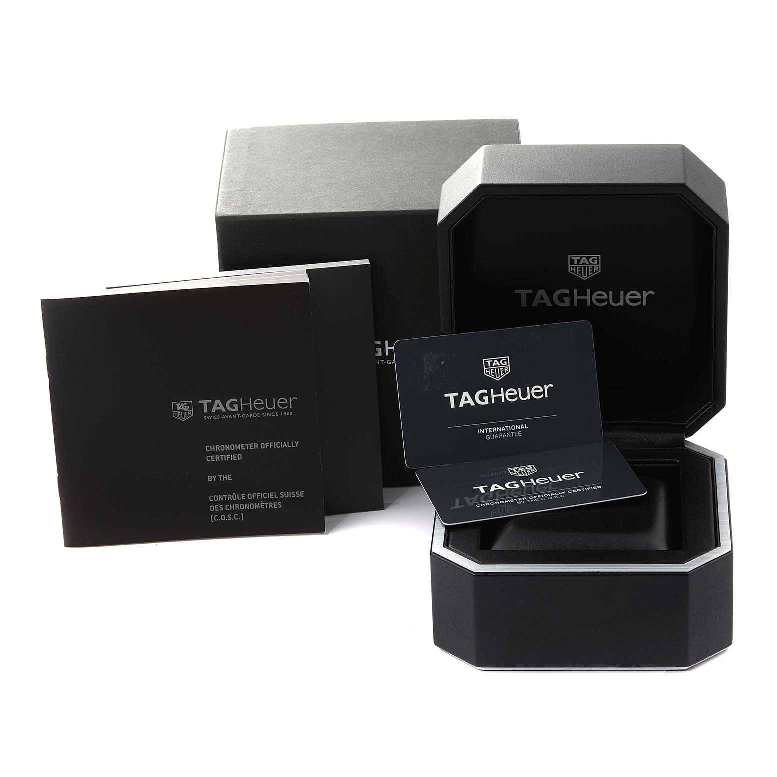The image shows the packaging, warranty card, and documentation for a Tag Heuer Carrera CAR5A5Y.FC6377 Men's Titanium Black Dial CAR5A5Y.FC6377 Men's Titanium Black Dial watch.
