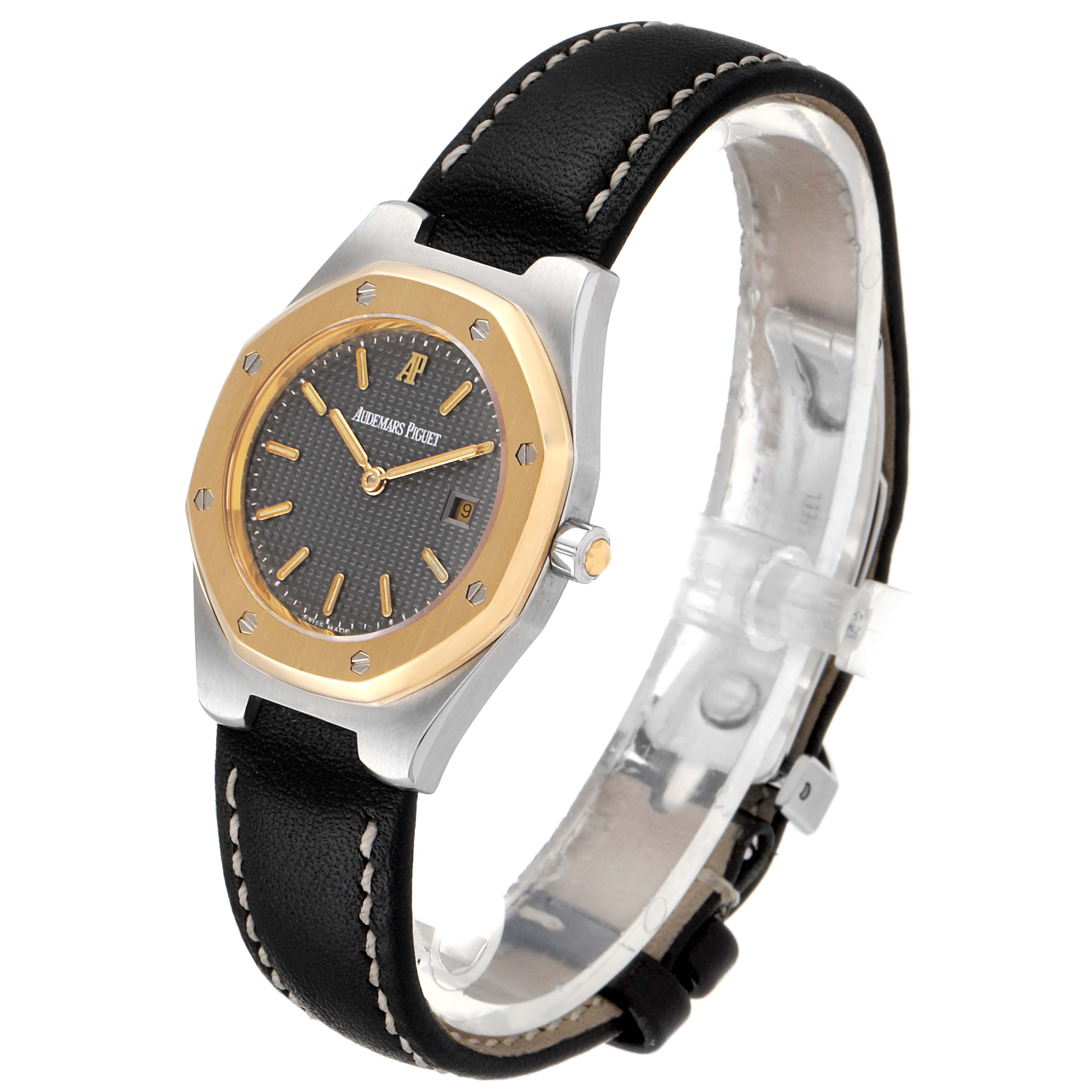 The image shows a side angle view of the Audemars Piguet Royal Oak  Women's Steel and Gold (two tone) Grey Dial  Women's Steel and Gold (two tone) Grey Dial watch, highlighting its bezel, dial, and leather strap.
