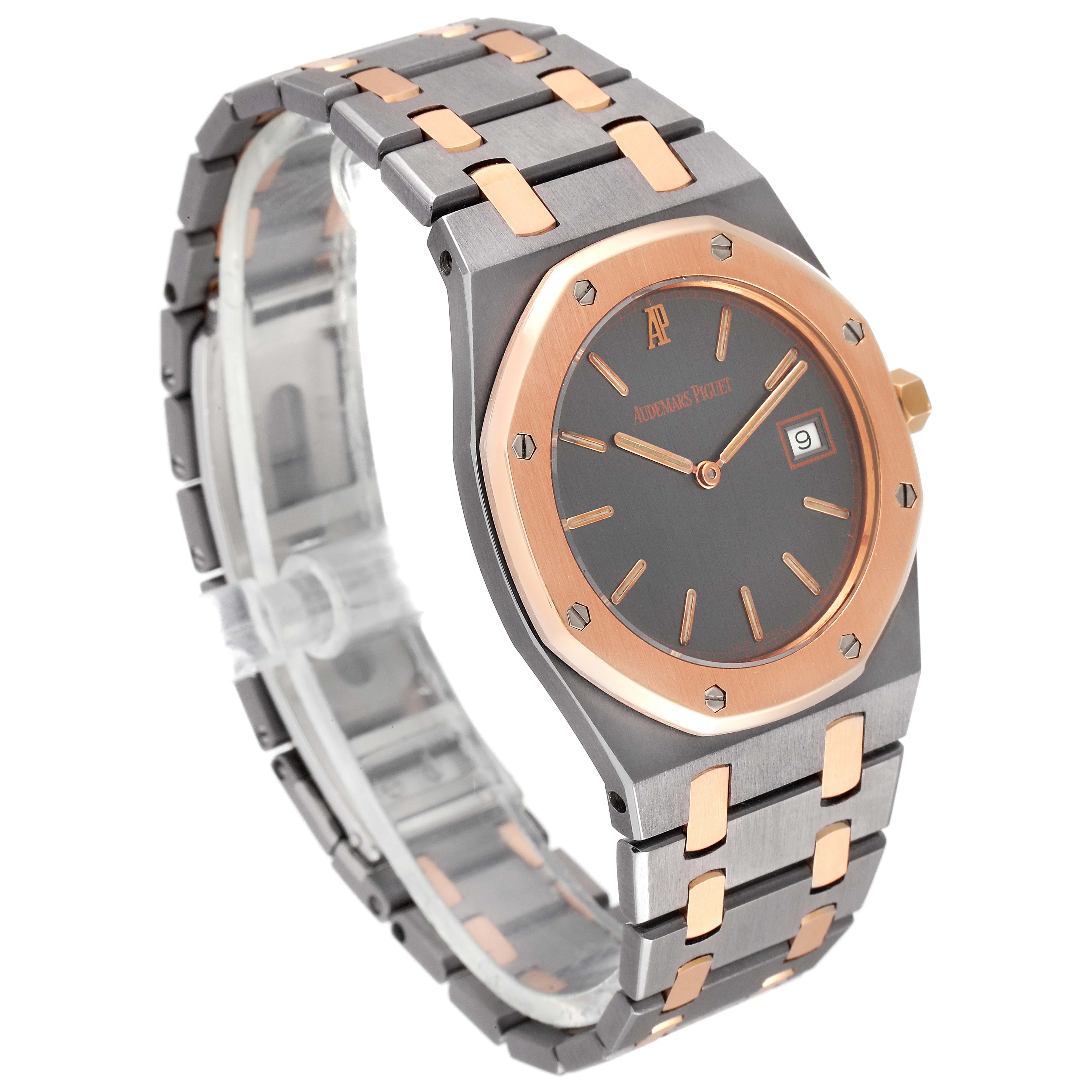 The image shows a Royal Oak model by Audemars Piguet at a three-quarter angle, displaying the watch face, bezel, and bracelet.