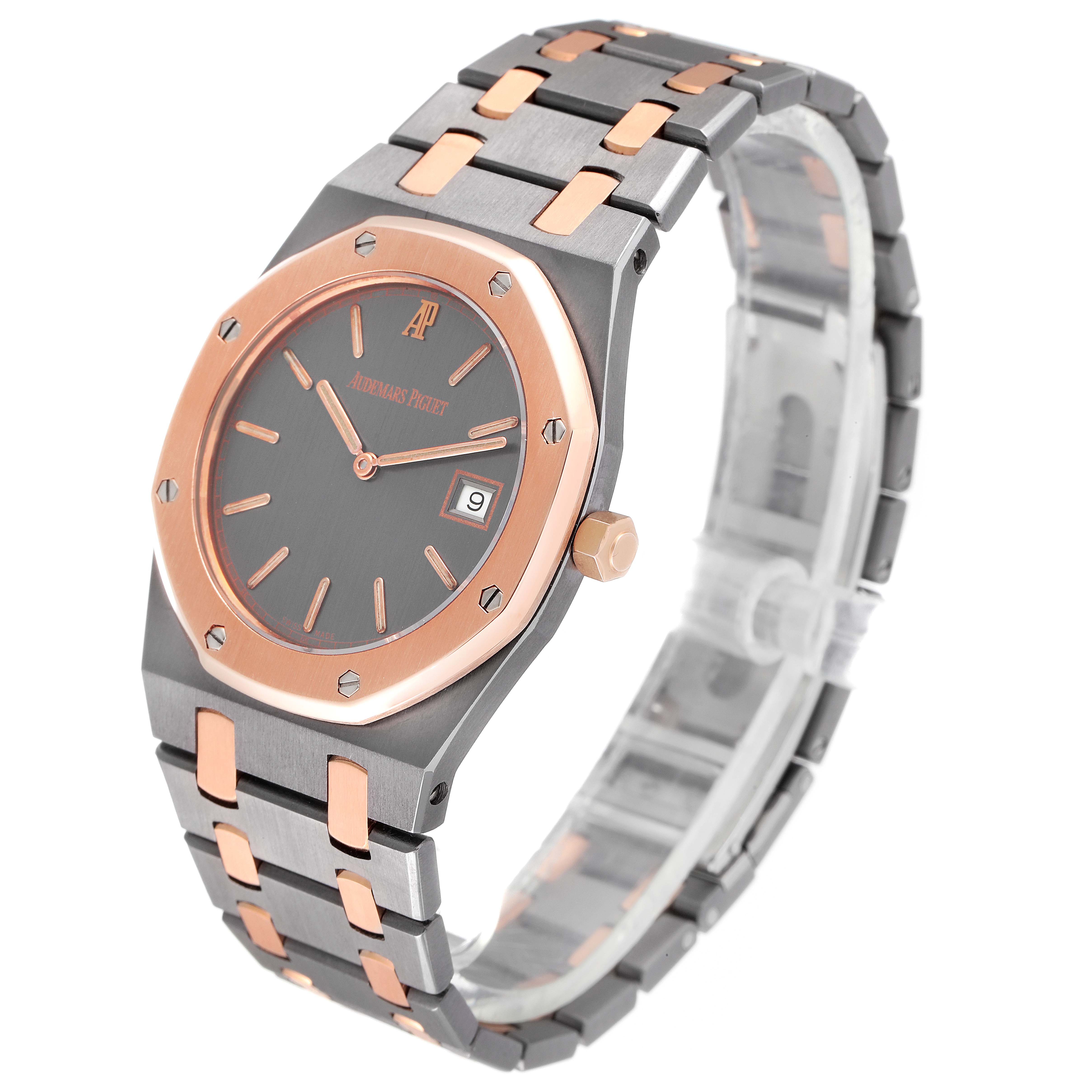 This Audemars Piguet Royal Oak 56175TR-OO-0789TR-01 Men's Steel and Gold (two tone) Black Dial 56175TR-OO-0789TR-01 Men's Steel and Gold (two tone) Black Dial watch is shown at a three-quarter angle, highlighting its face, bezel, bracelet, and crown.