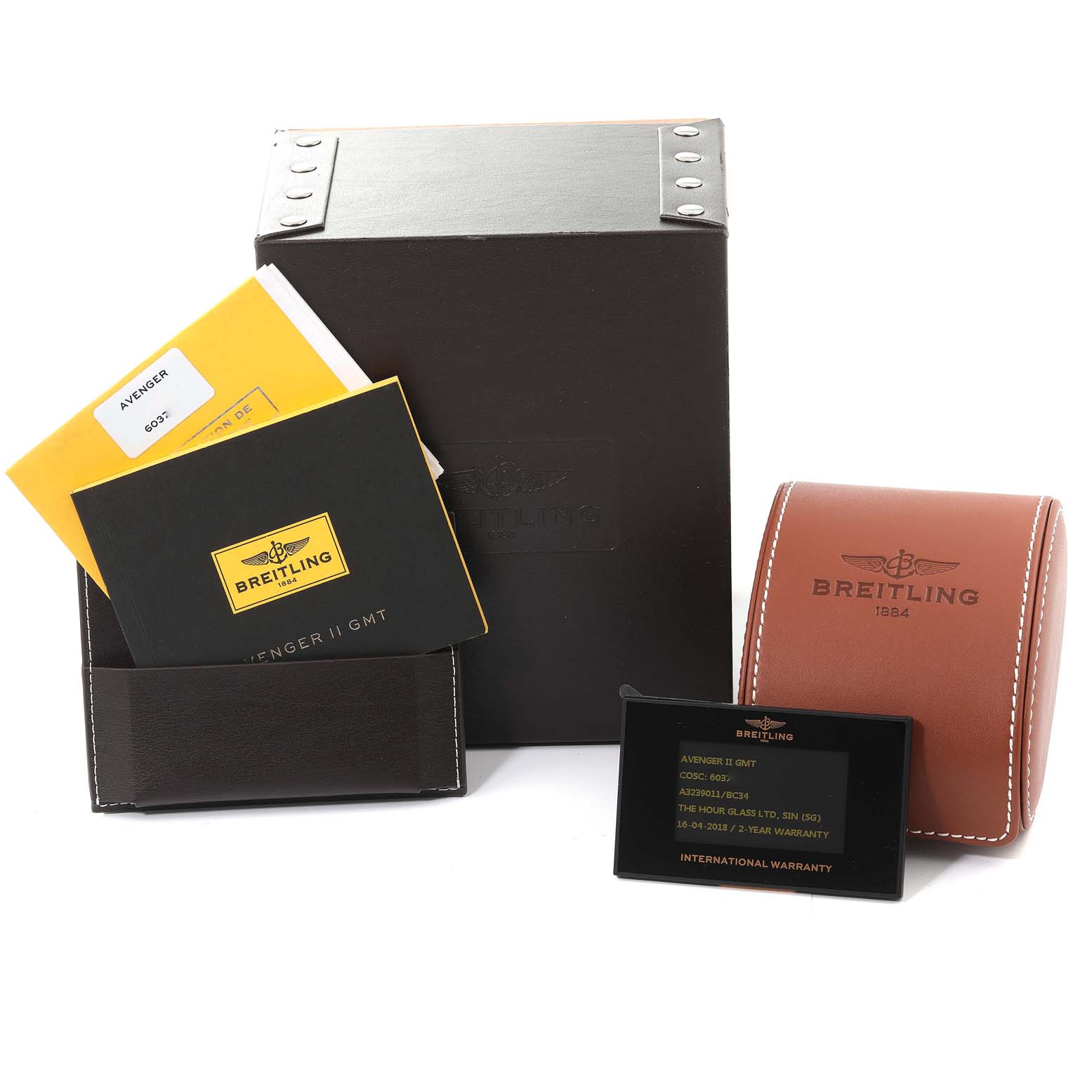 The image shows the packaging, manuals, international warranty card, and leather case of a Breitling Avenger A3239011/BC34 Men's Stainless Steel Black Dial A3239011/BC34 Men's Stainless Steel Black Dial model watch.