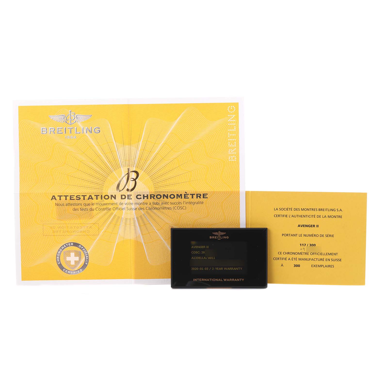 The image shows Breitling Avenger A133811A/A811 Men's Stainless Steel White Dial A133811A/A811 Men's Stainless Steel White Dial model documentation and warranty cards, displayed from a top-down angle.