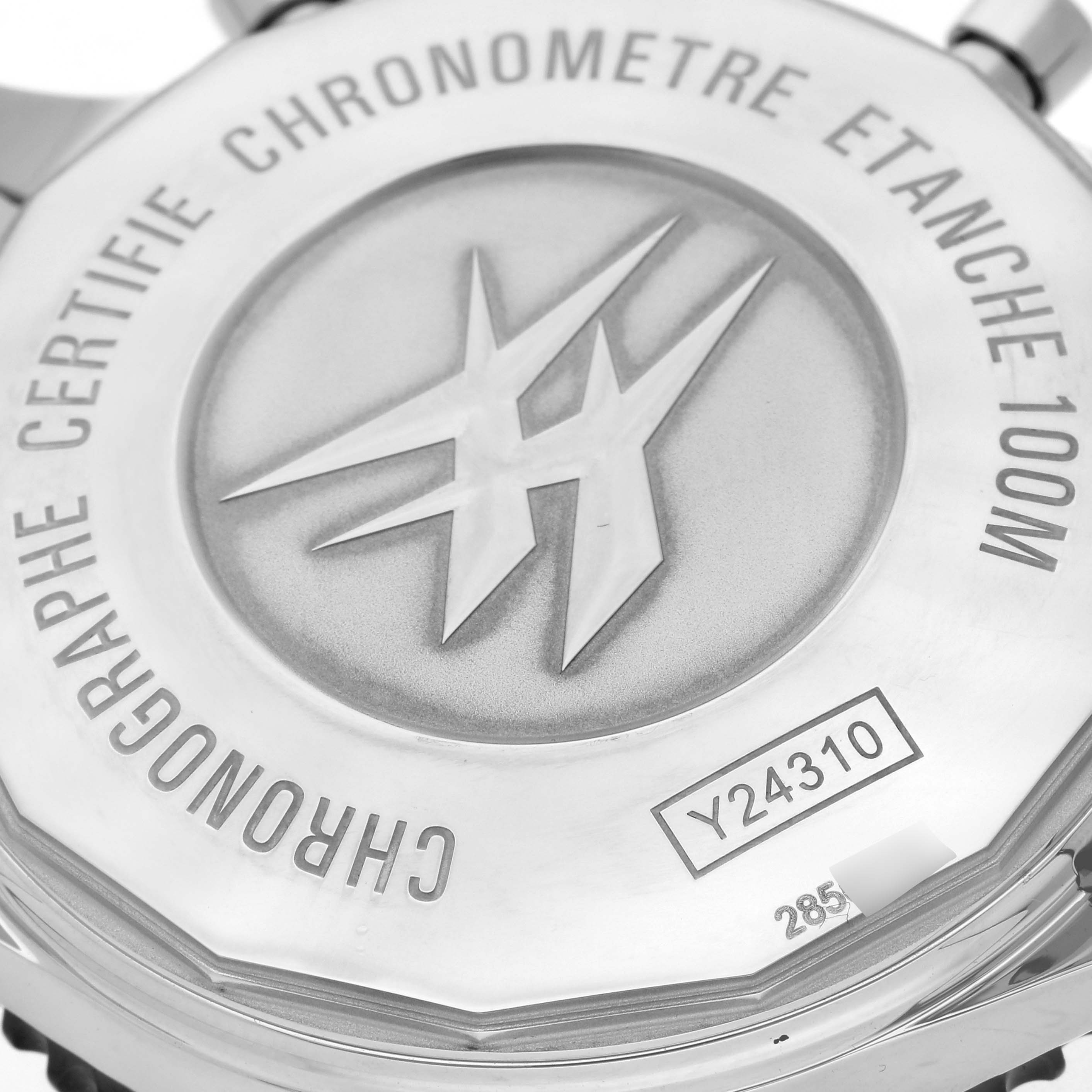 The image shows the back case of a Breitling Chronoliner Y2431012/BE10 Men's Stainless Steel Black Dial Y2431012/BE10 Men's Stainless Steel Black Dial watch, featuring engravings and a logo.