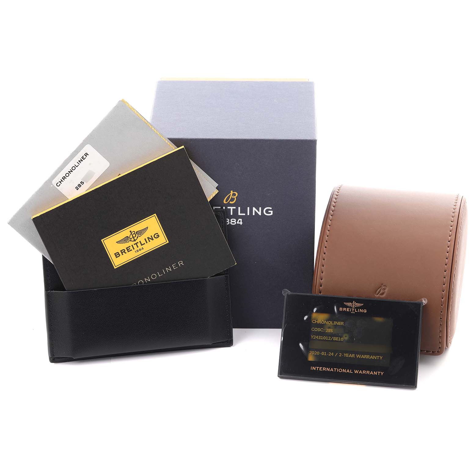 The image shows accessories for the Breitling Chronoliner Y2431012/BE10 Men's Stainless Steel Black Dial Y2431012/BE10 Men's Stainless Steel Black Dial, including a box, warranty card, manuals, and a watch case.