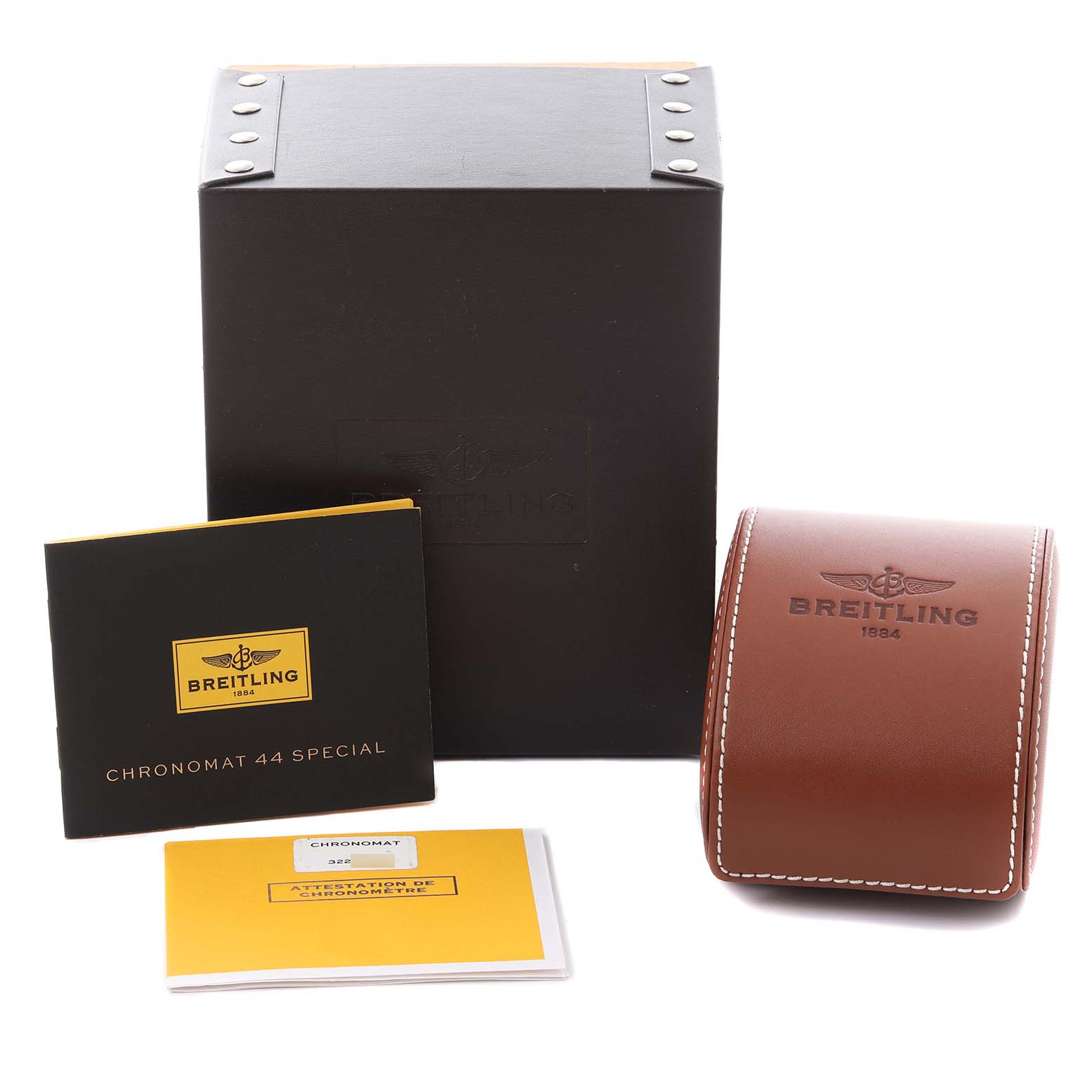 The image shows a Breitling Chronomat AB0115 Men's Stainless Steel Blue Dial AB0115 Men's Stainless Steel Blue Dial watch box, a leather case, and accompanying booklets at a front angle.