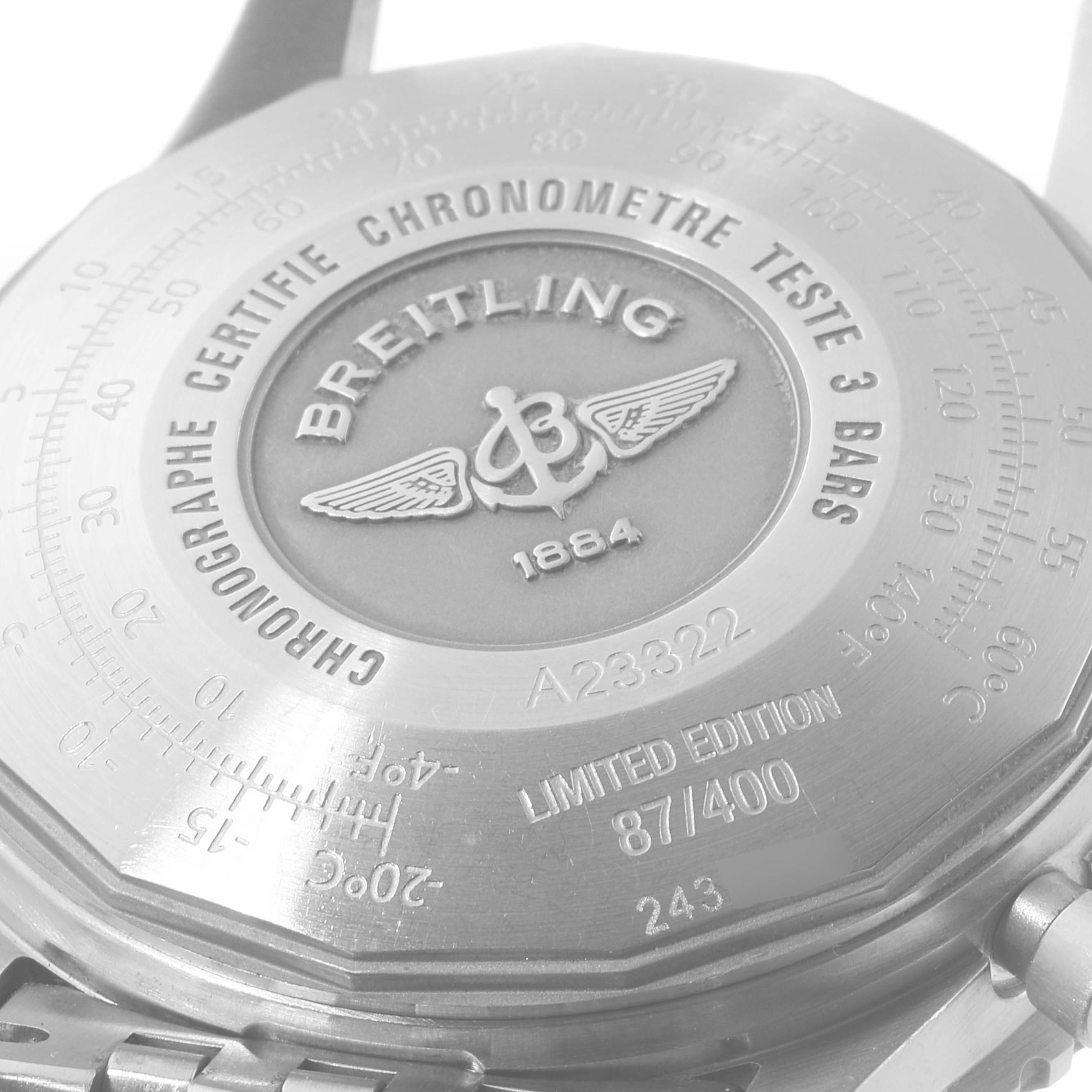 The image shows the back of a Breitling Navitimer A23322 Men's Stainless Steel Silver Dial A23322 Men's Stainless Steel Silver Dial watch, highlighting the engravings and limited edition number.