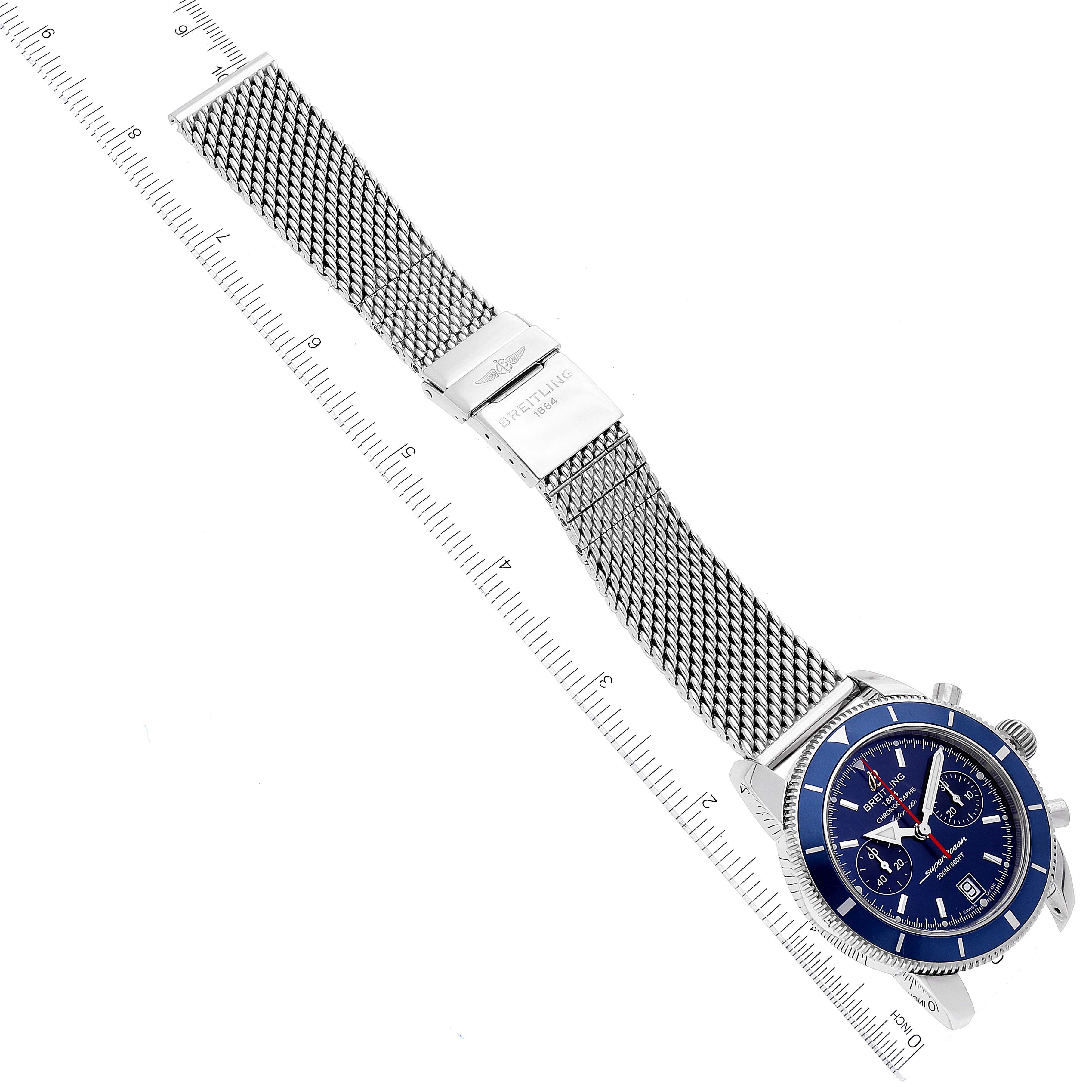 The Breitling Superocean A23370 Men's Stainless Steel Blue Dial A23370 Men's Stainless Steel Blue Dial watch is shown from a top-down angle, highlighting its face, mesh strap, and clasp.